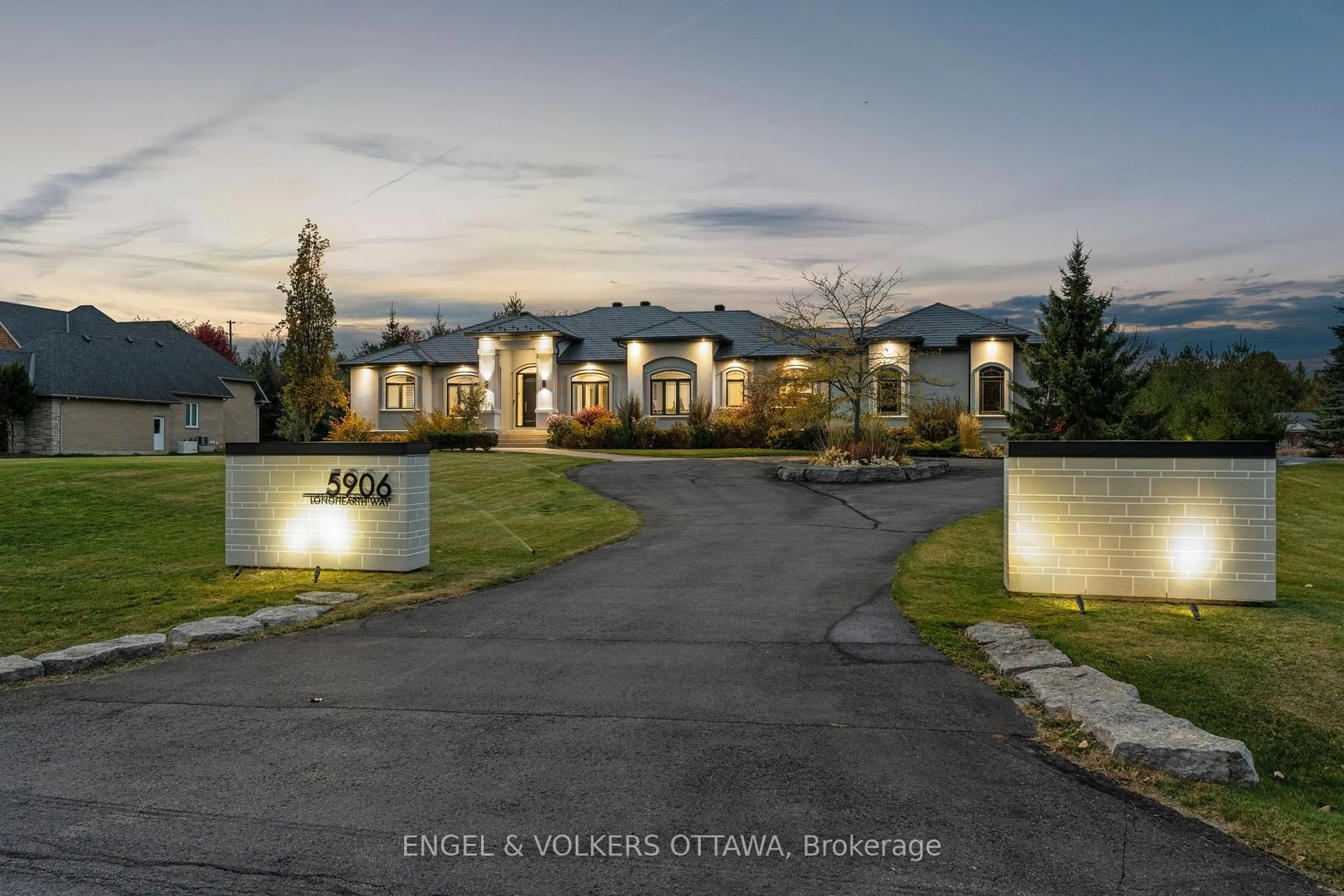 A pic from outside/outdoor area/front of a property/back of a property/a pic from drone, mountain view for 5906 Longhearth Way, Manotick Ontario K4M 1M1