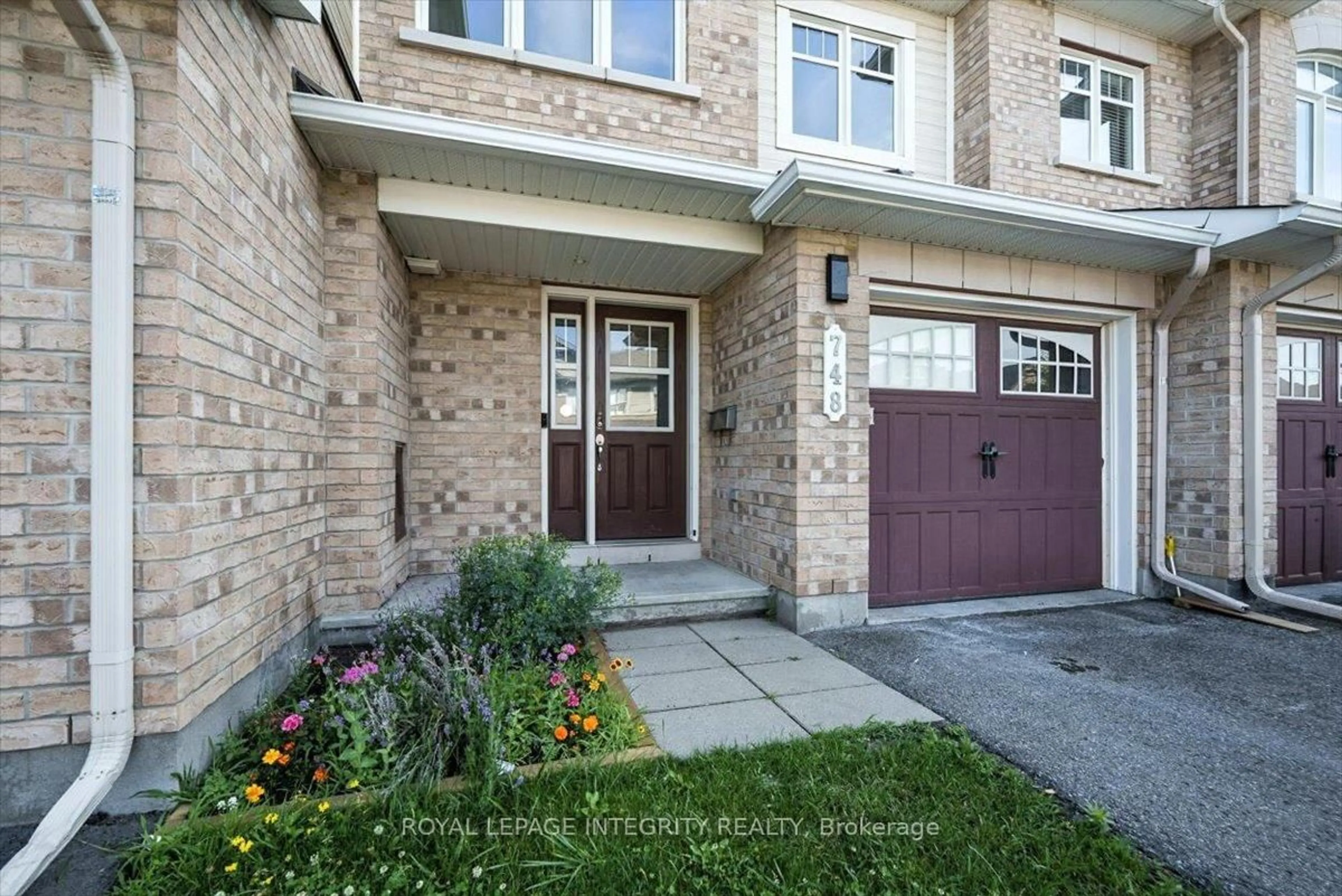 Home with brick exterior material, street for 748 Morningstar Way, Ottawa Ontario K1W 0G6