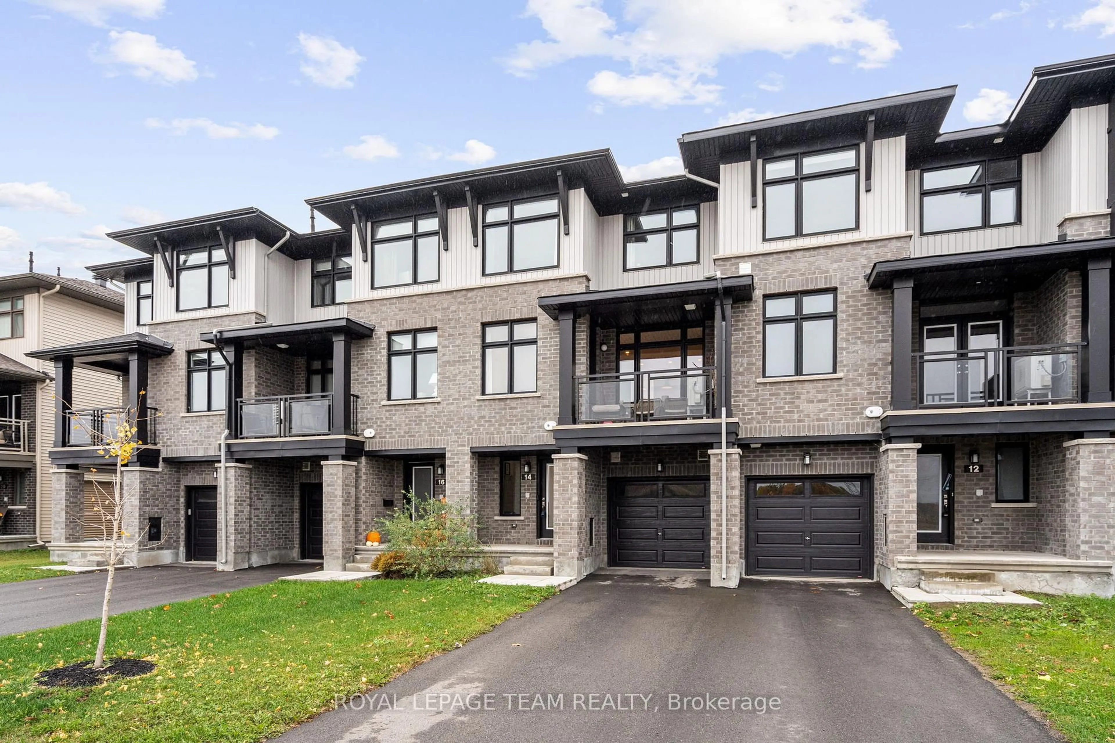 Home with brick exterior material, street for 14 Verglas Lane, Ottawa Ontario K1W 0P5