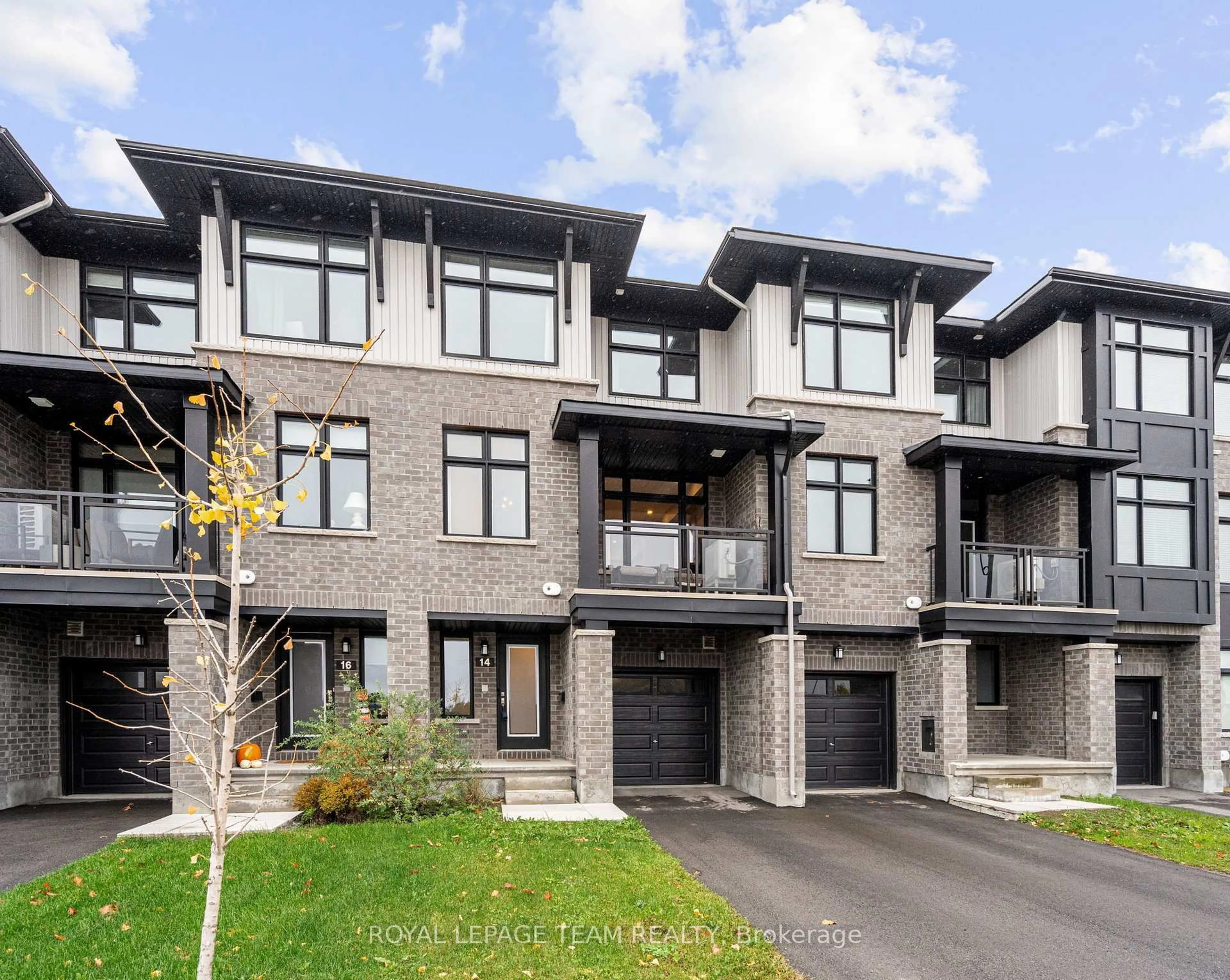 Home with brick exterior material, street for 14 Verglas Lane, Ottawa Ontario K1W 0P5