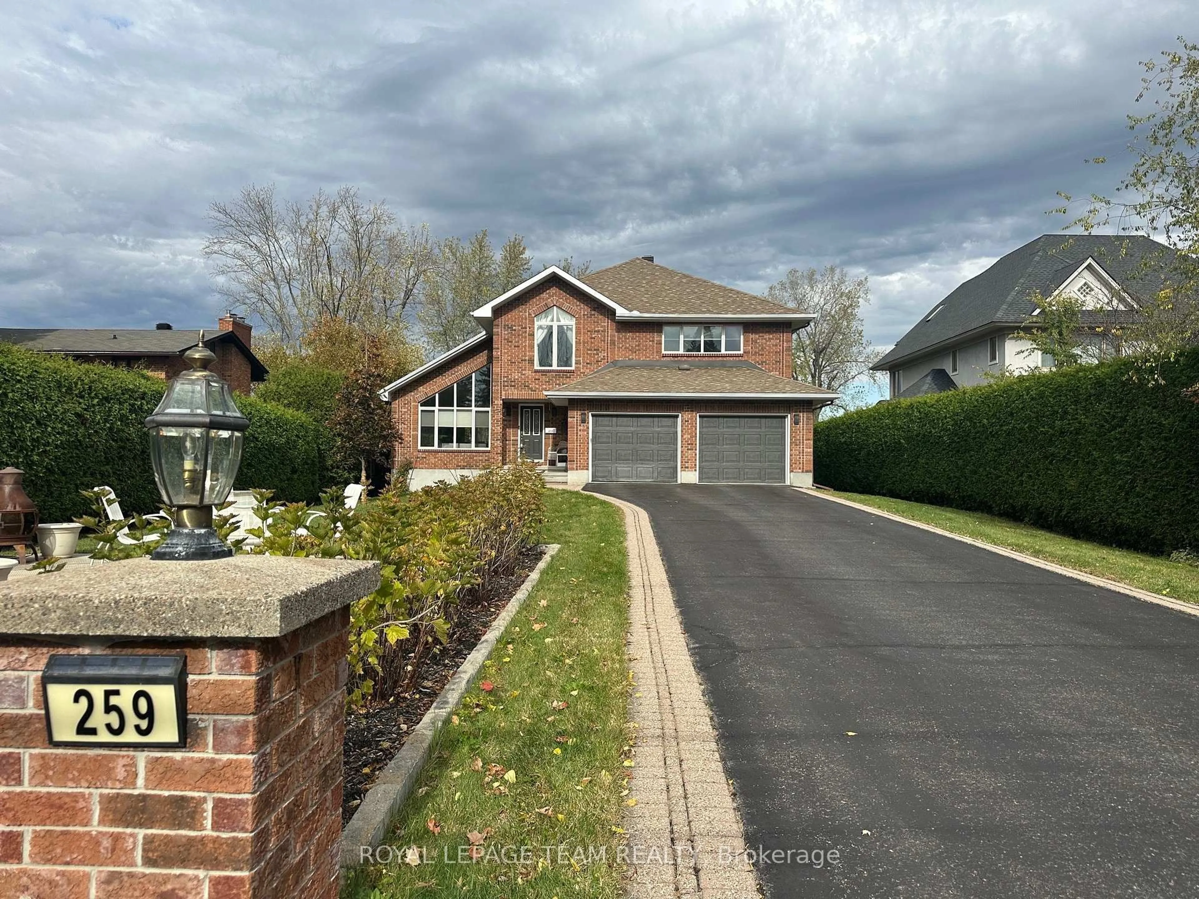 Home with brick exterior material, street for 259 GRANDVIEW Rd, Ottawa Ontario K2H 8B9