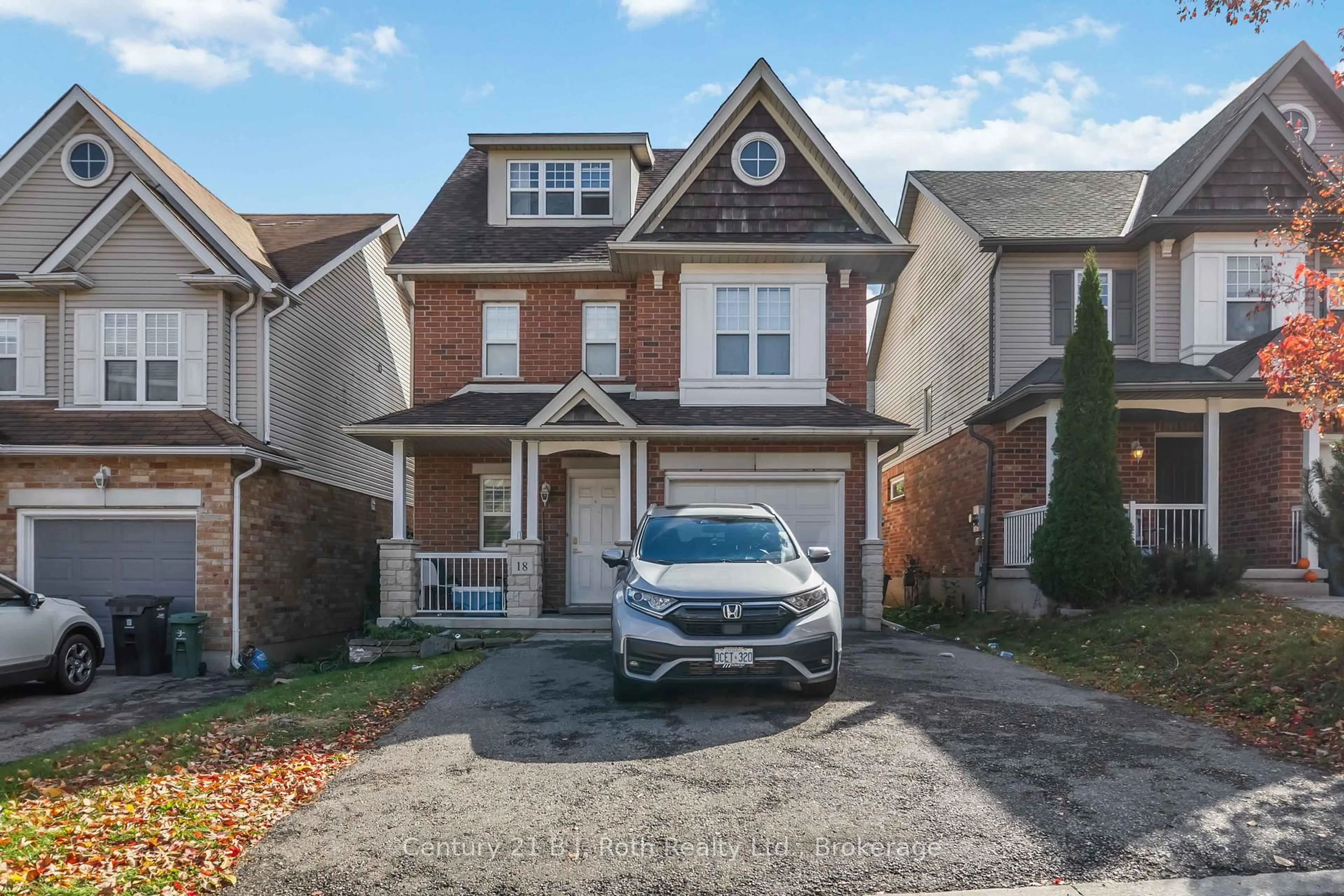 Home with brick exterior material, street for 18 Darnell Rd, Guelph Ontario N1G 5K3