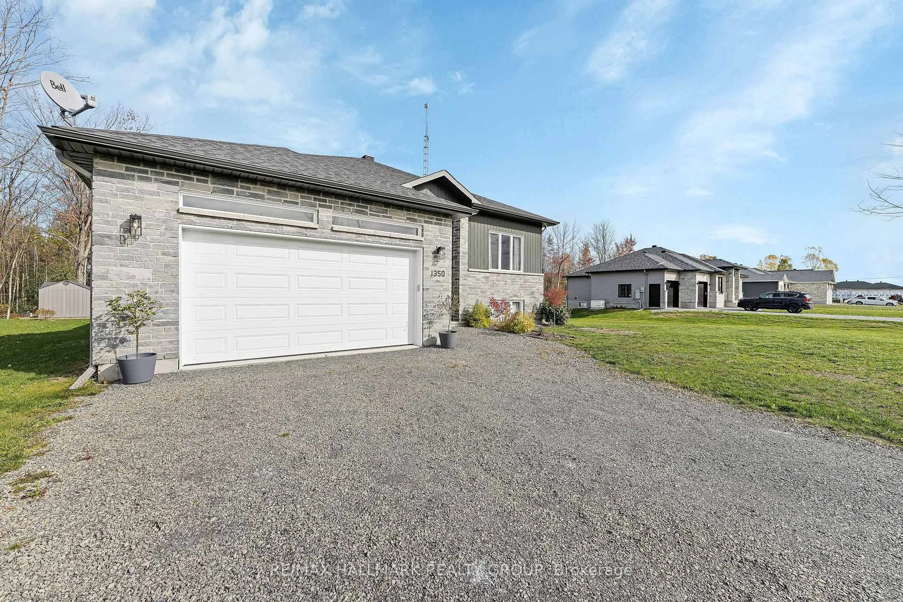 A pic from outside/outdoor area/front of a property/back of a property/a pic from drone, street for 1350 Country Lane, North Dundas Ontario K0C 2K0