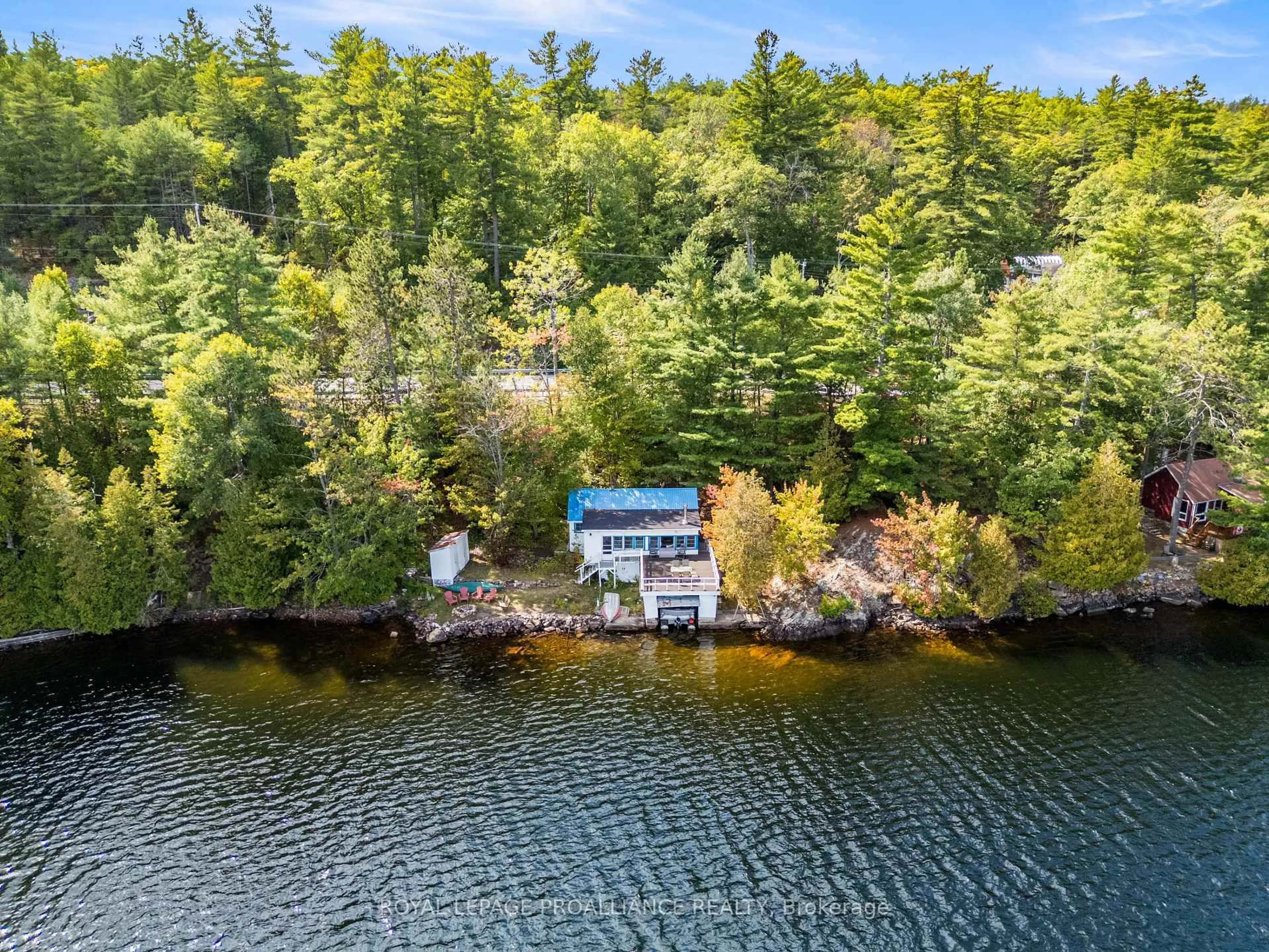 A pic from outside/outdoor area/front of a property/back of a property/a pic from drone, water/lake/river/ocean view for 17547 Highway 41, Cloyne Ontario K0H 1K0