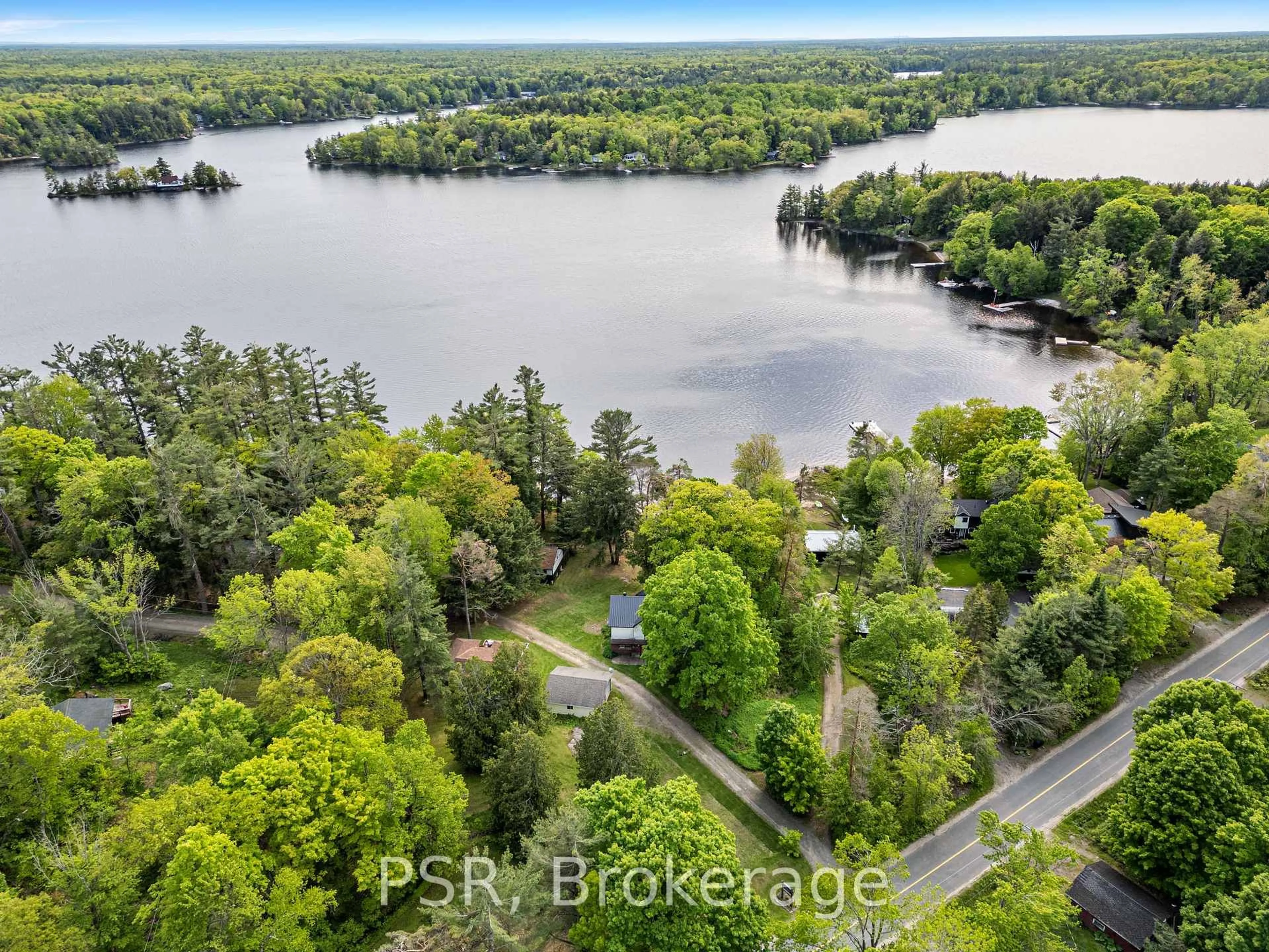 A pic from outside/outdoor area/front of a property/back of a property/a pic from drone, water/lake/river/ocean view for 1113 Moon River Rd, Muskoka Lakes Ontario P0C 1A0