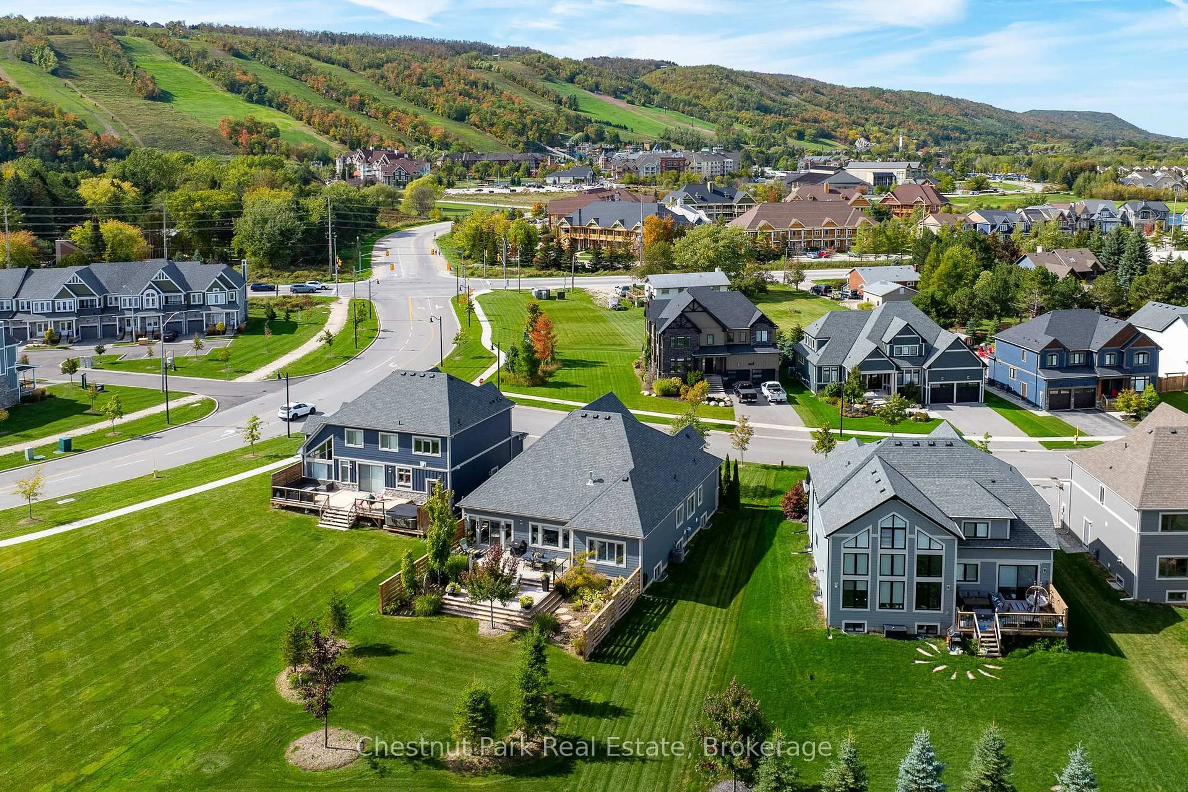 A pic from outside/outdoor area/front of a property/back of a property/a pic from drone, mountain view for 103 Creekwood Crt, Blue Mountains Ontario L9Y 0V1