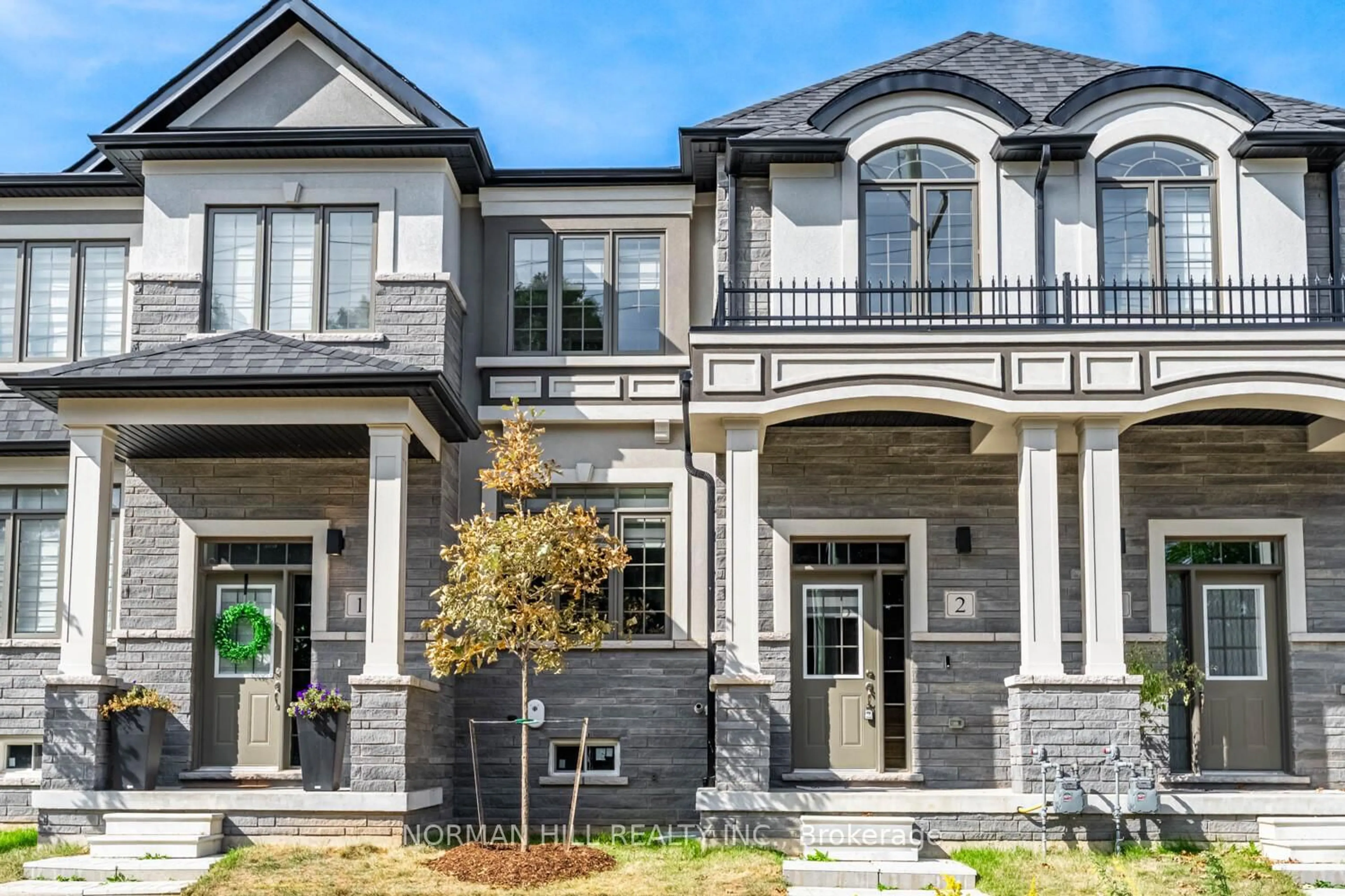 Home with brick exterior material, street for 305 Garner Rd #2, Hamilton Ontario L9G 3E6