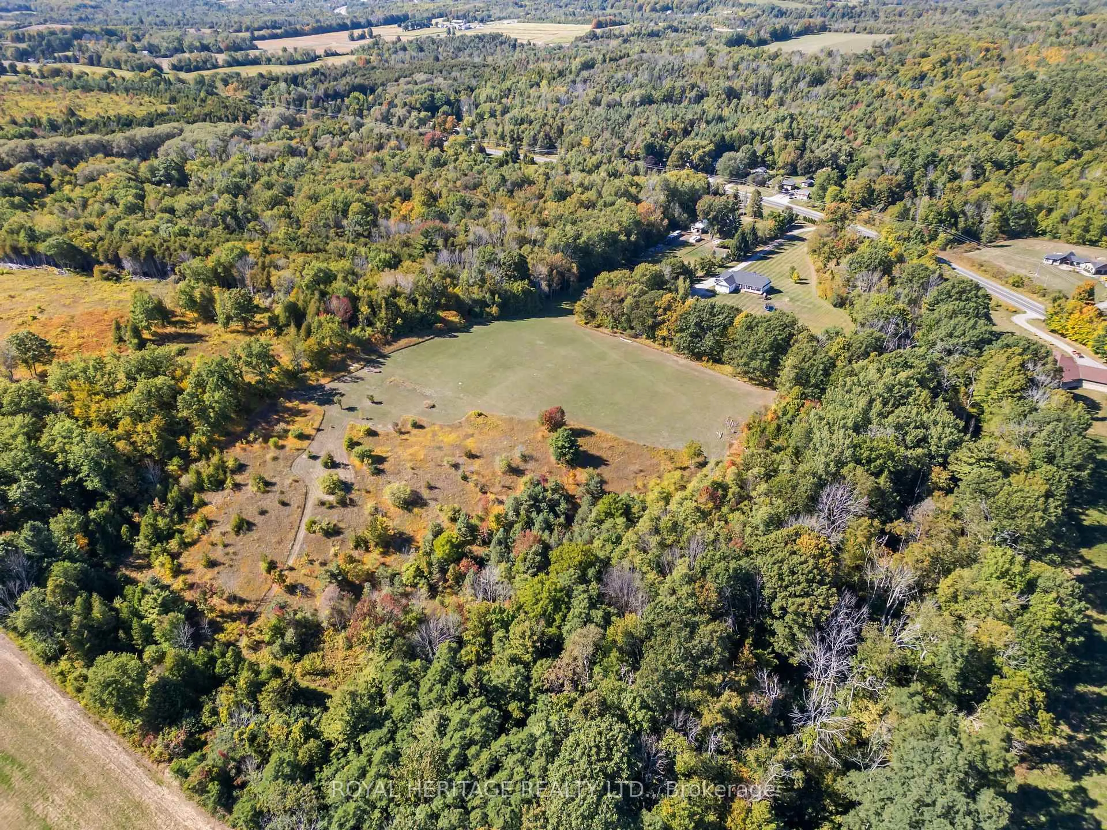 A pic from outside/outdoor area/front of a property/back of a property/a pic from drone, forest/trees view for 10629 County Rd 2 Rd, Alnwick/Haldimand Ontario K0K 2G0