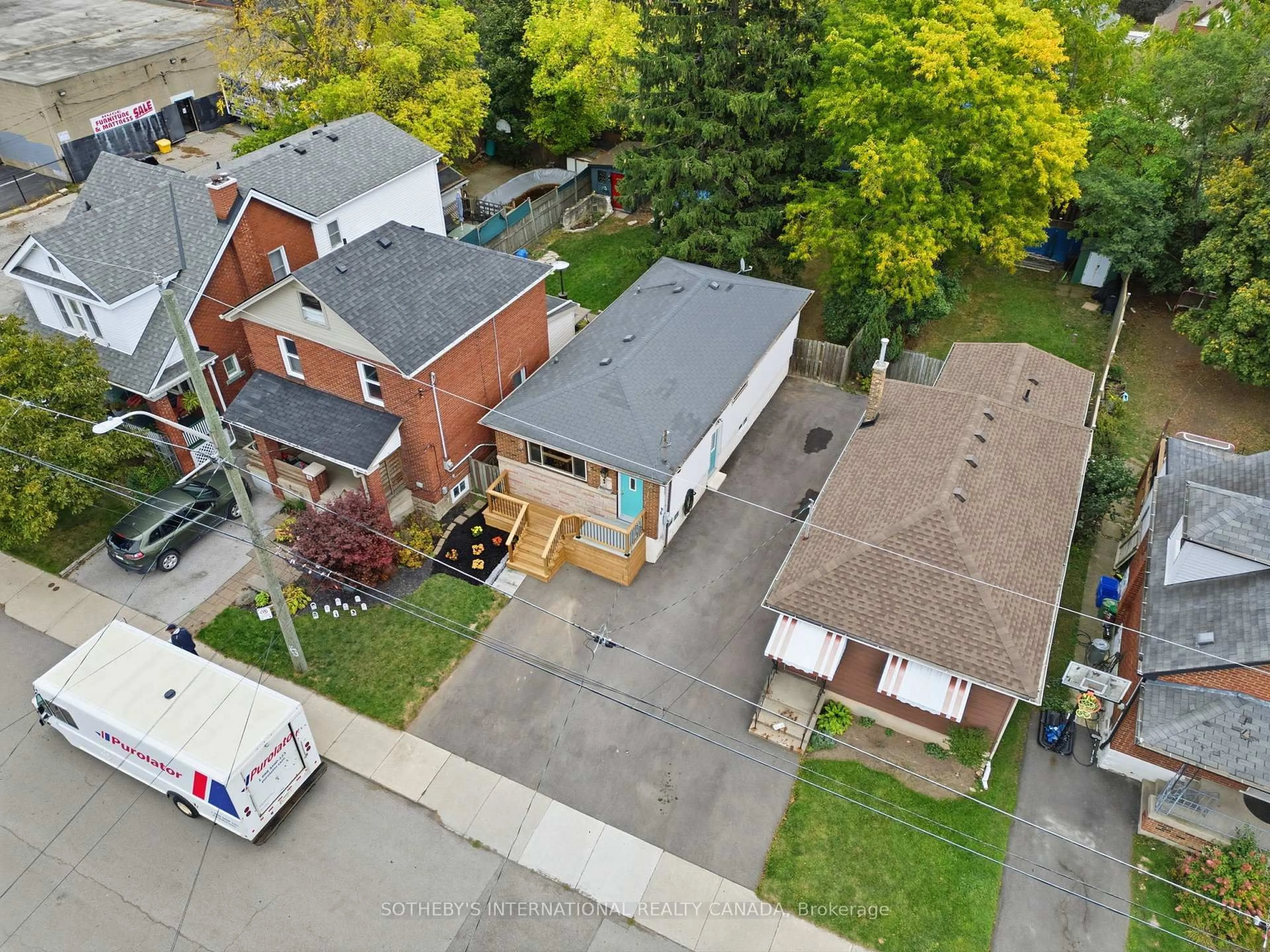 A pic from outside/outdoor area/front of a property/back of a property/a pic from drone, street for 23 East 16th St, Hamilton Ontario L9A 4J1