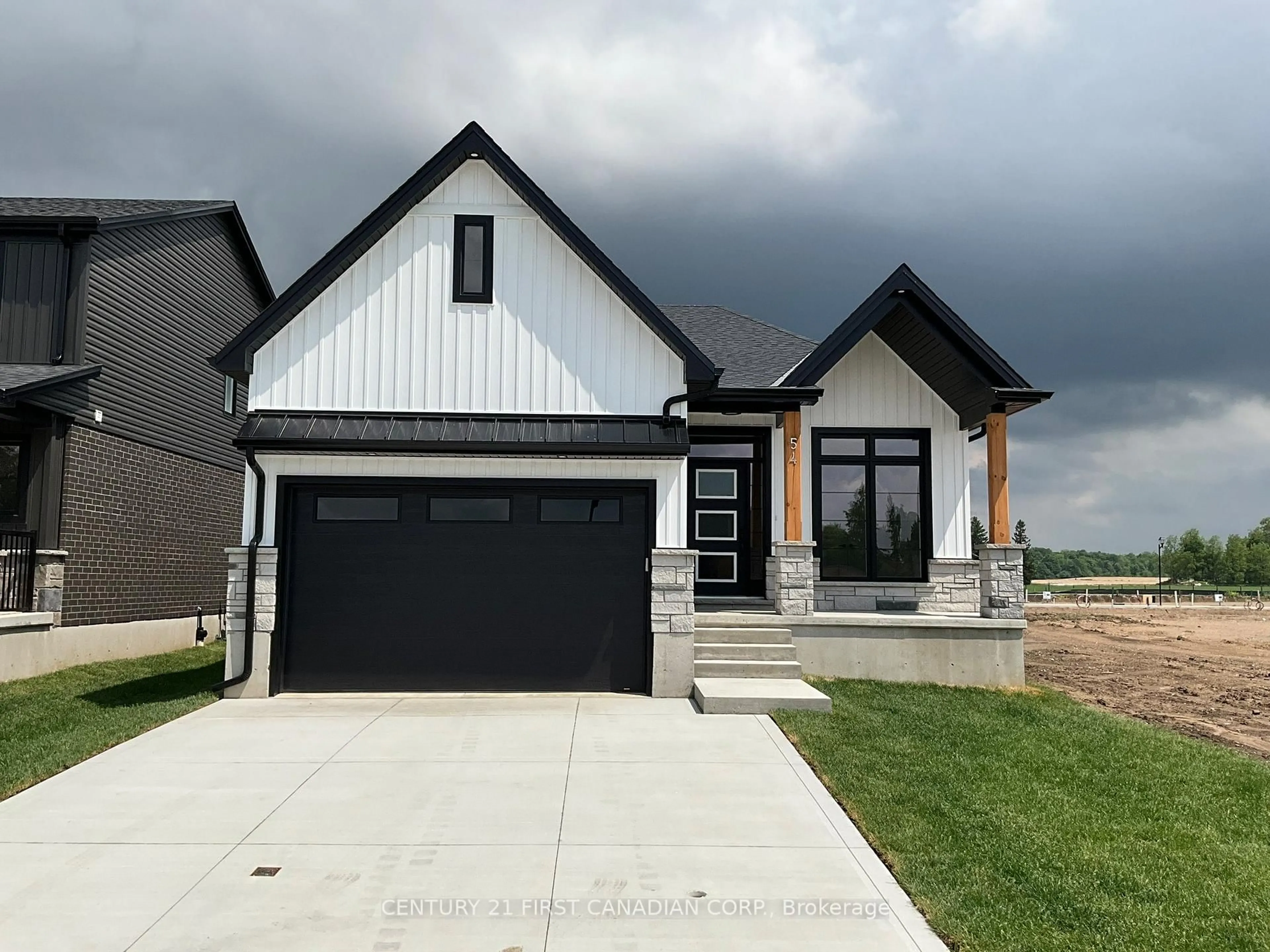 Home with brick exterior material, street for 56 POSTMA Cres, North Middlesex Ontario N0M 1A0