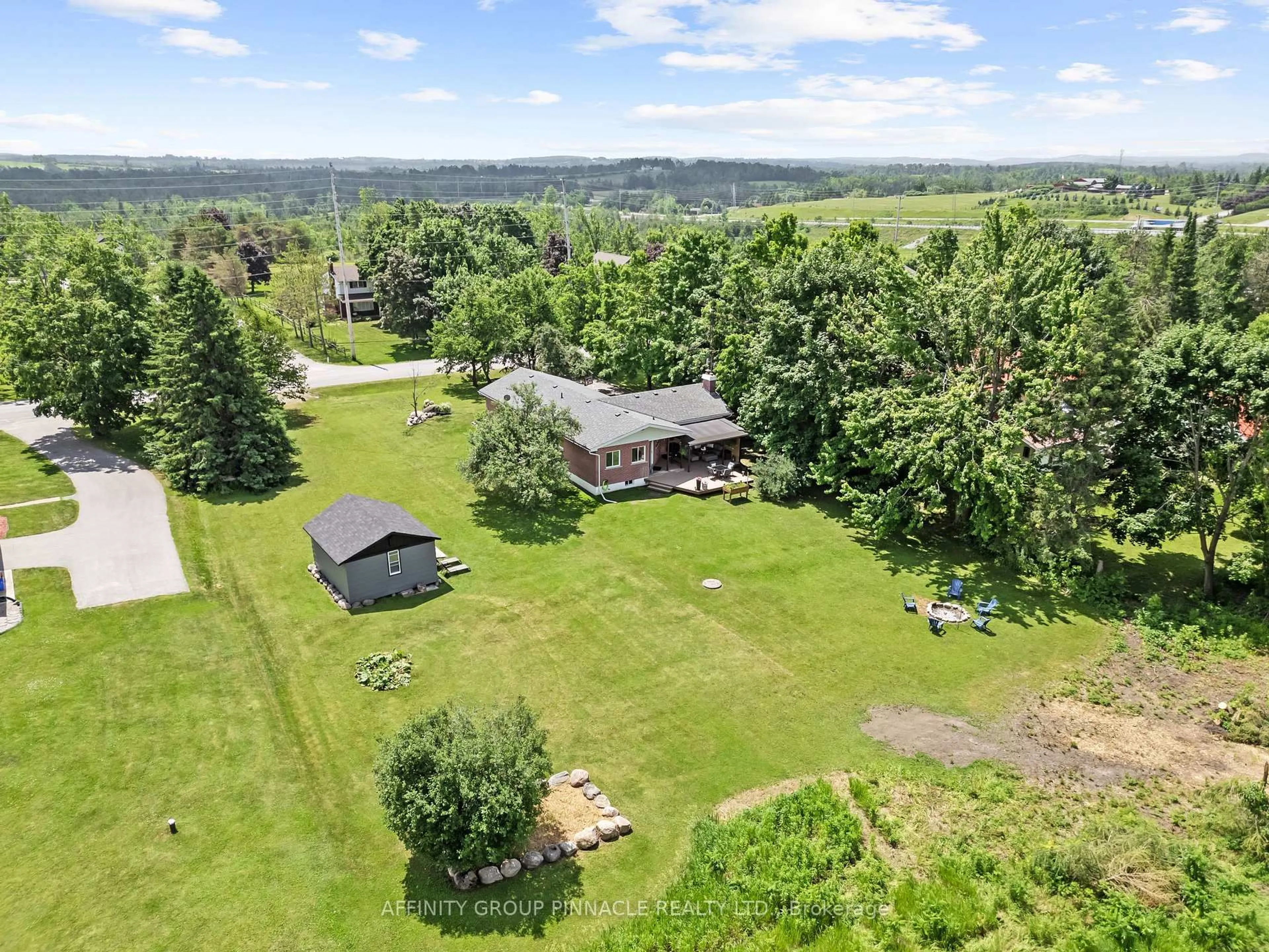 A pic from outside/outdoor area/front of a property/back of a property/a pic from drone, water/lake/river/ocean view for 46 Lily Lake Rd, Selwyn Ontario K9J 6X4
