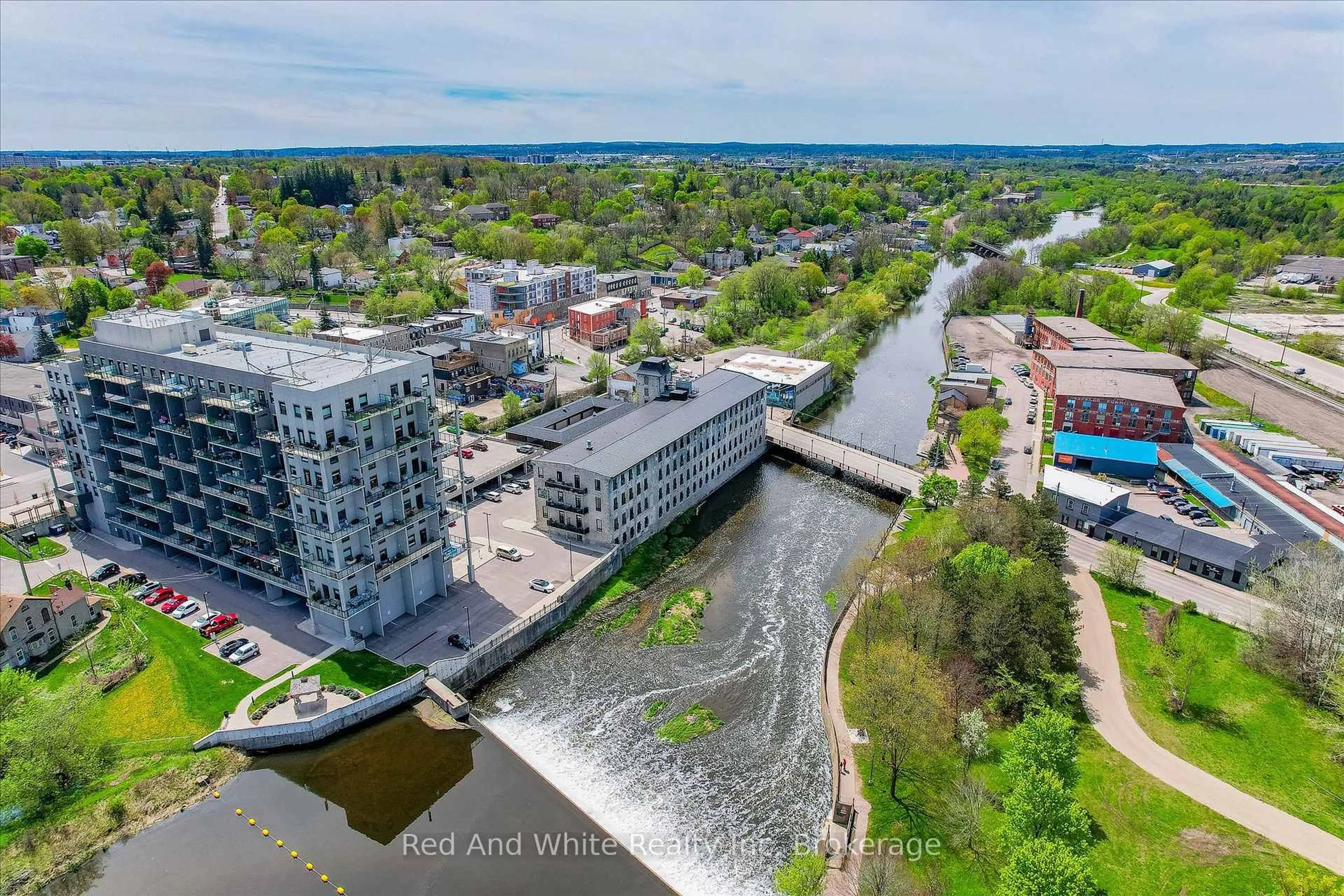 A pic from outside/outdoor area/front of a property/back of a property/a pic from drone, water/lake/river/ocean view for 19 GUELPH Ave #308, Cambridge Ontario N3C 1A2