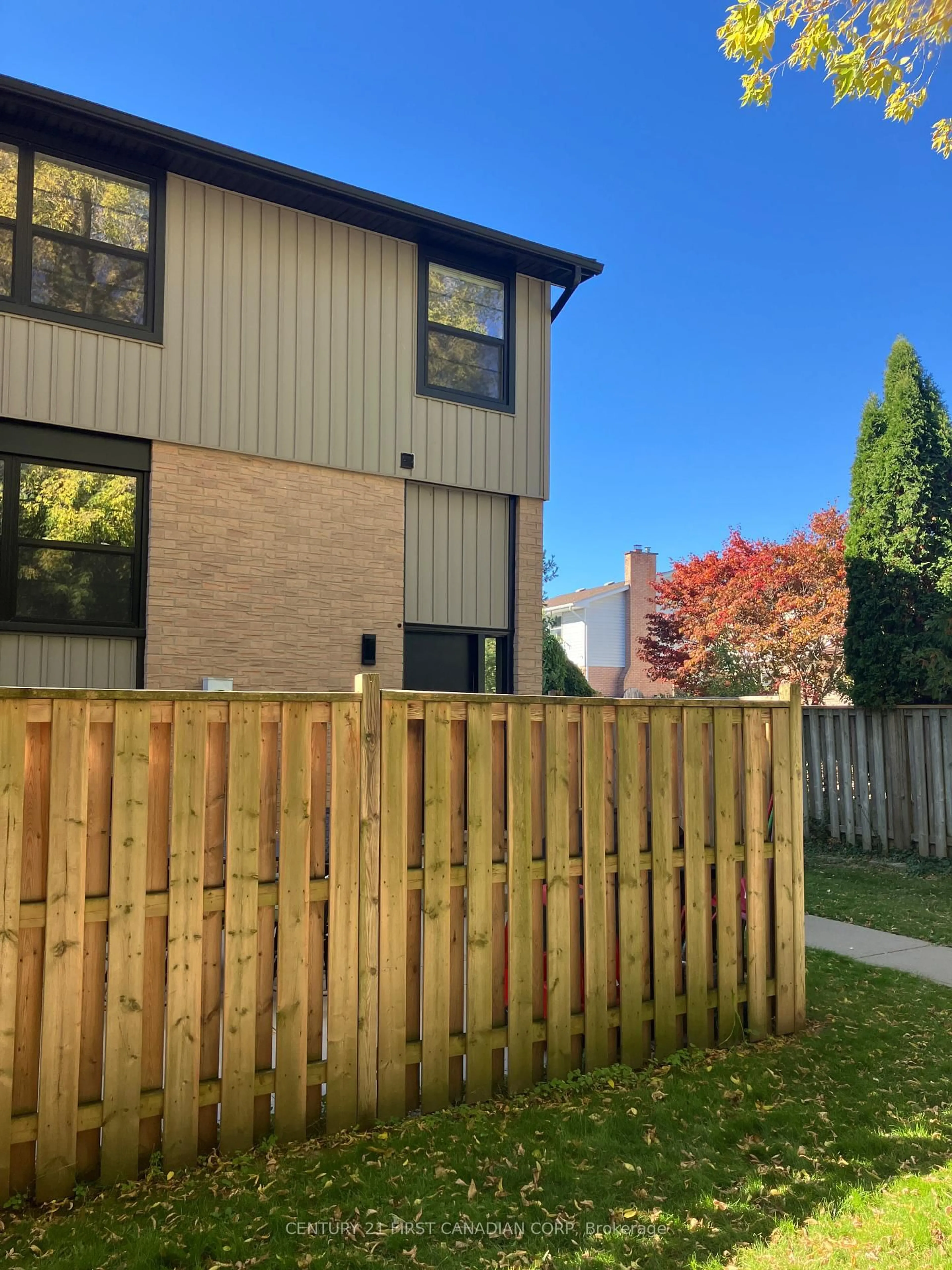 A pic from outside/outdoor area/front of a property/back of a property/a pic from drone, street for 105 Andover Dr #36, London South Ontario N6J 4B1