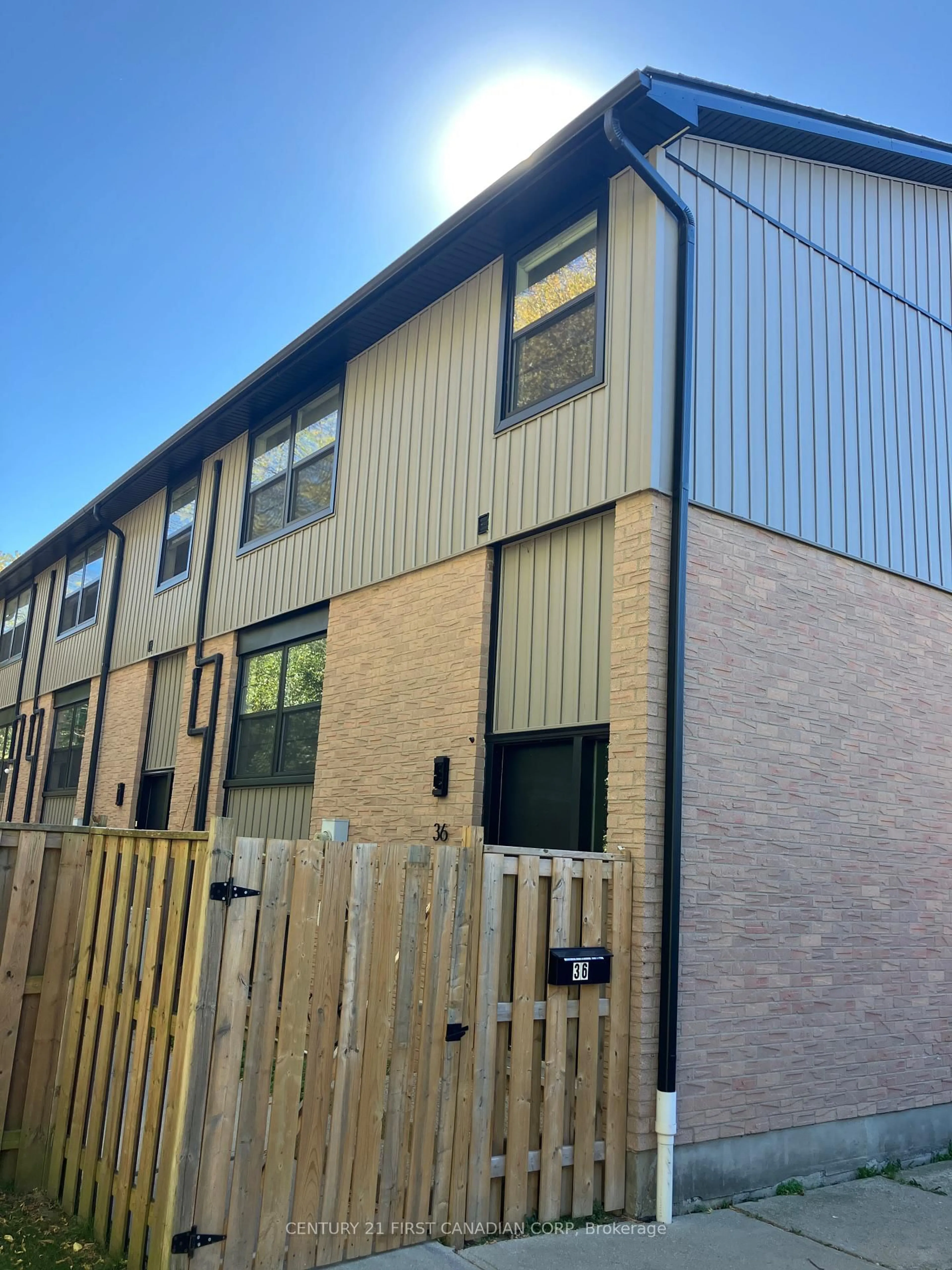 A pic from outside/outdoor area/front of a property/back of a property/a pic from drone, building for 105 Andover Dr #36, London South Ontario N6J 4B1