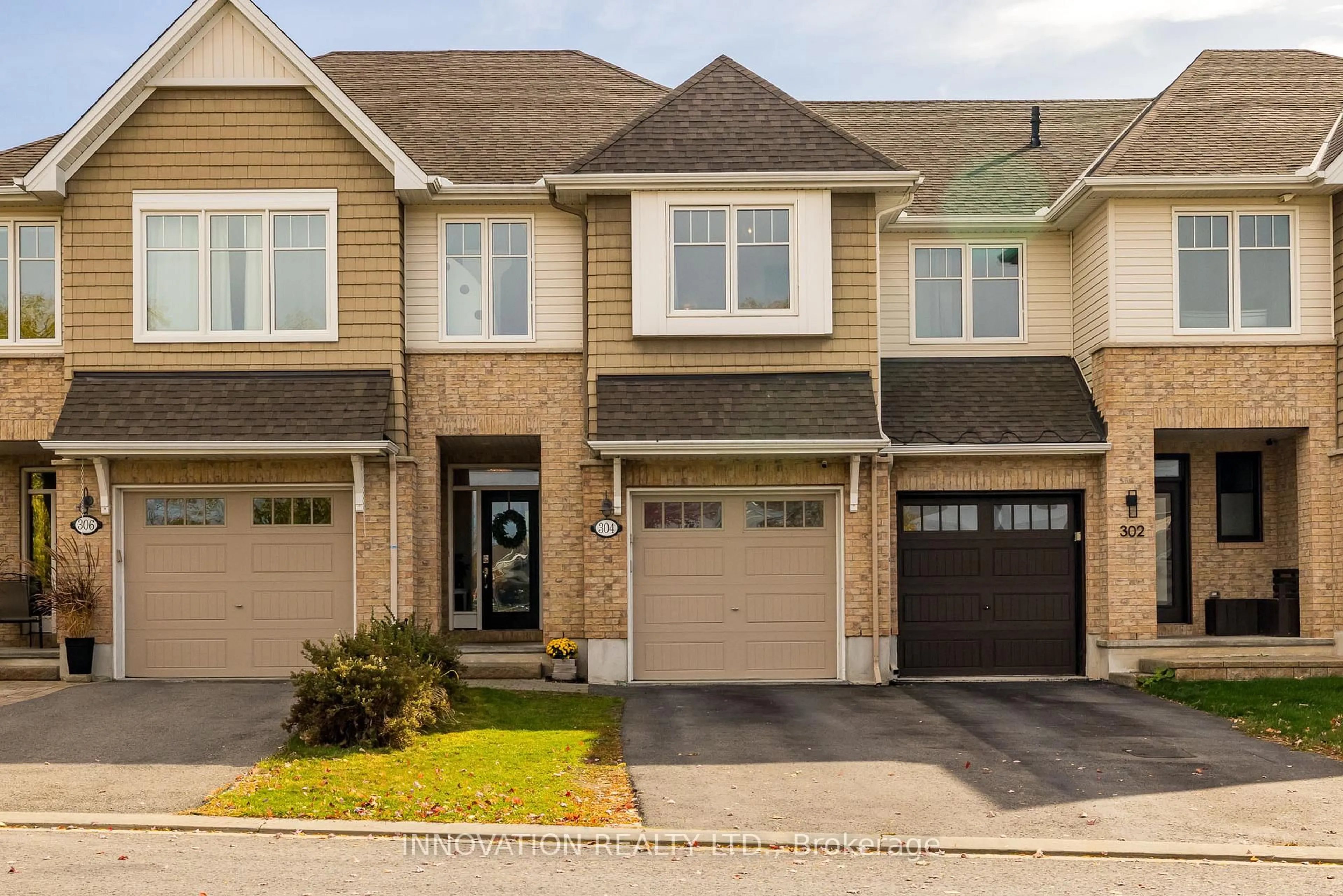 Home with brick exterior material, street for 304 Mishawashkode St, Ottawa Ontario K4A 0Y5