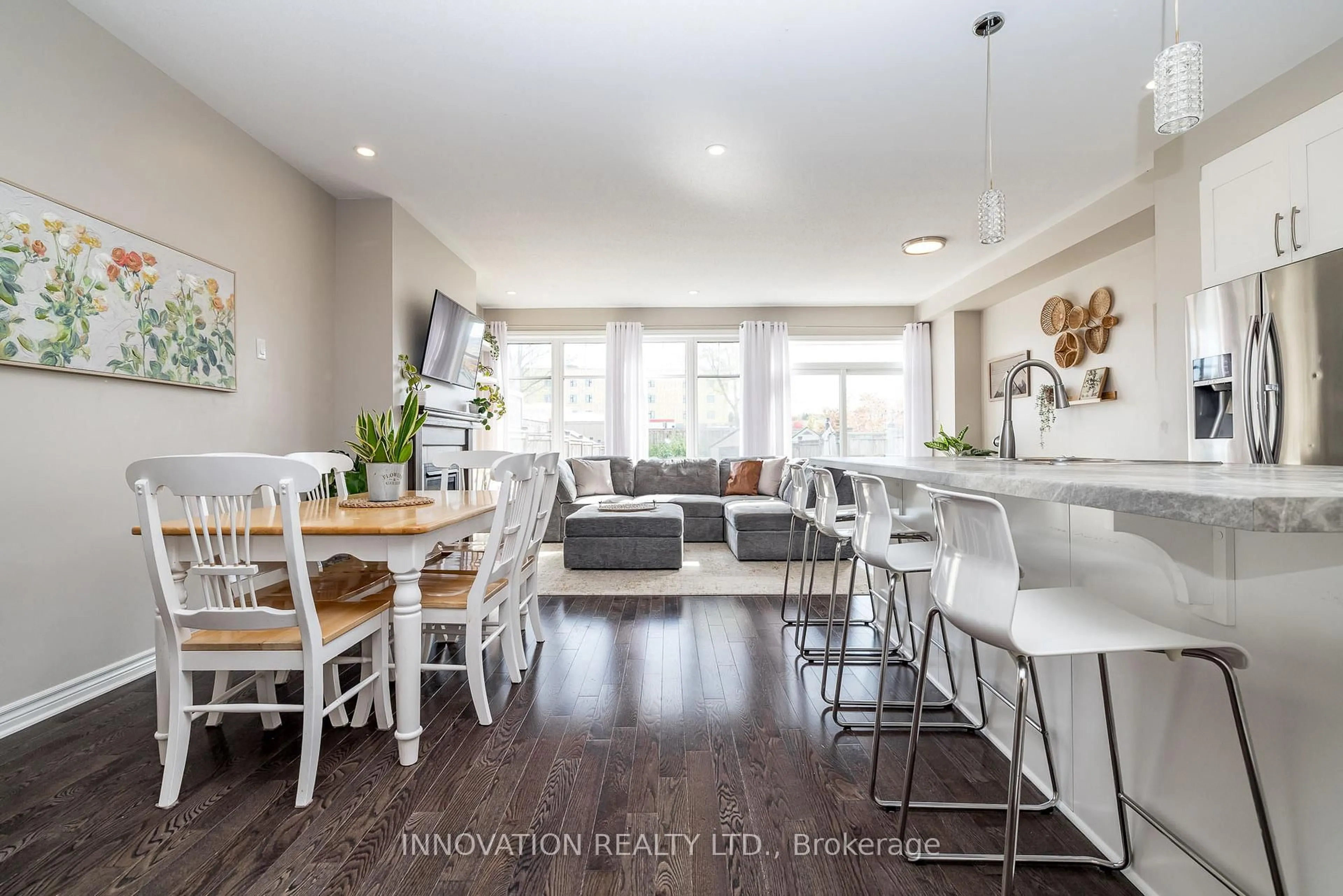 Open concept kitchen, wood/laminate floor for 304 Mishawashkode St, Ottawa Ontario K4A 0Y5
