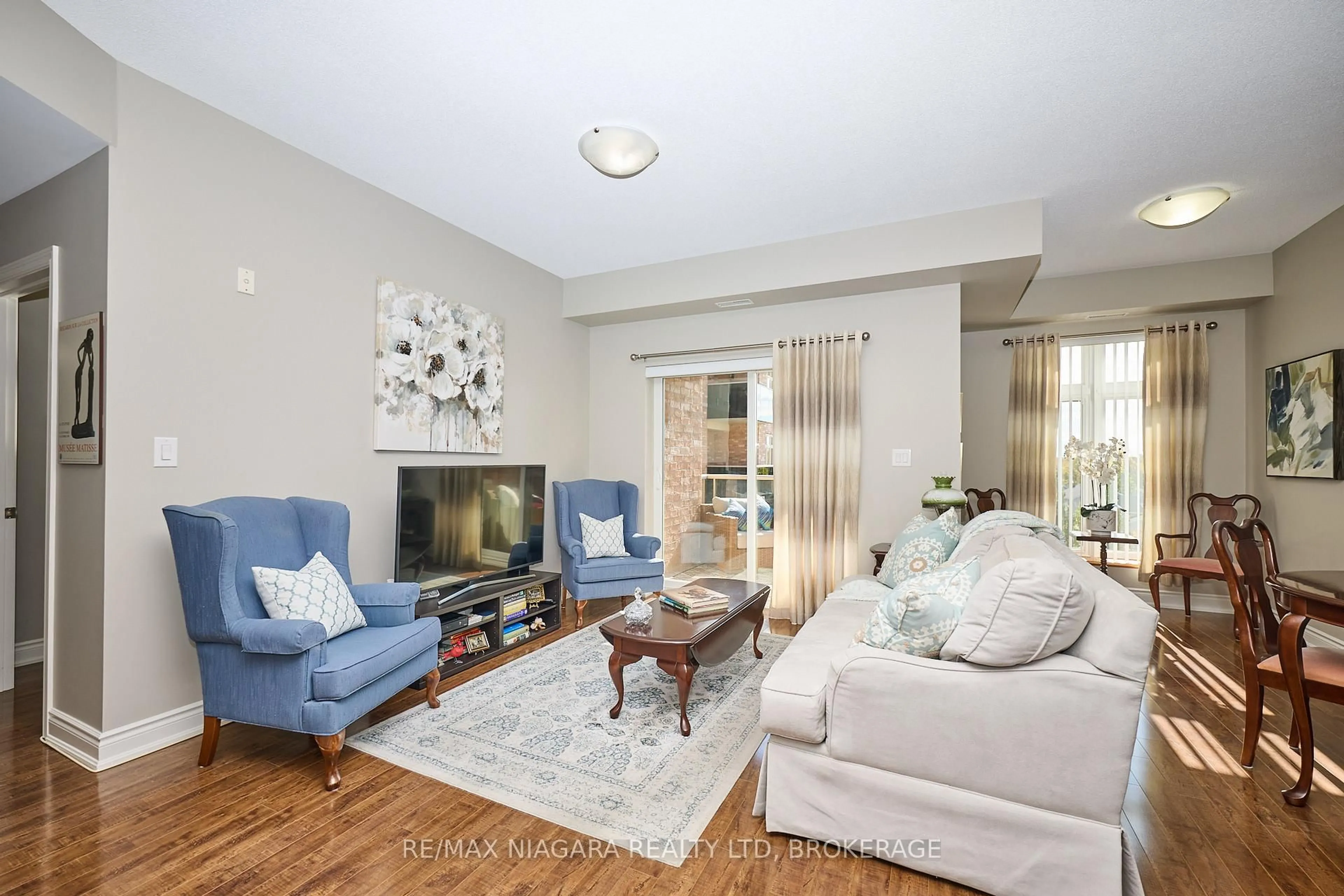 Living room with furniture, unknown for 8111 Forest Glen Dr #427, Niagara Falls Ontario L2H 2Y7