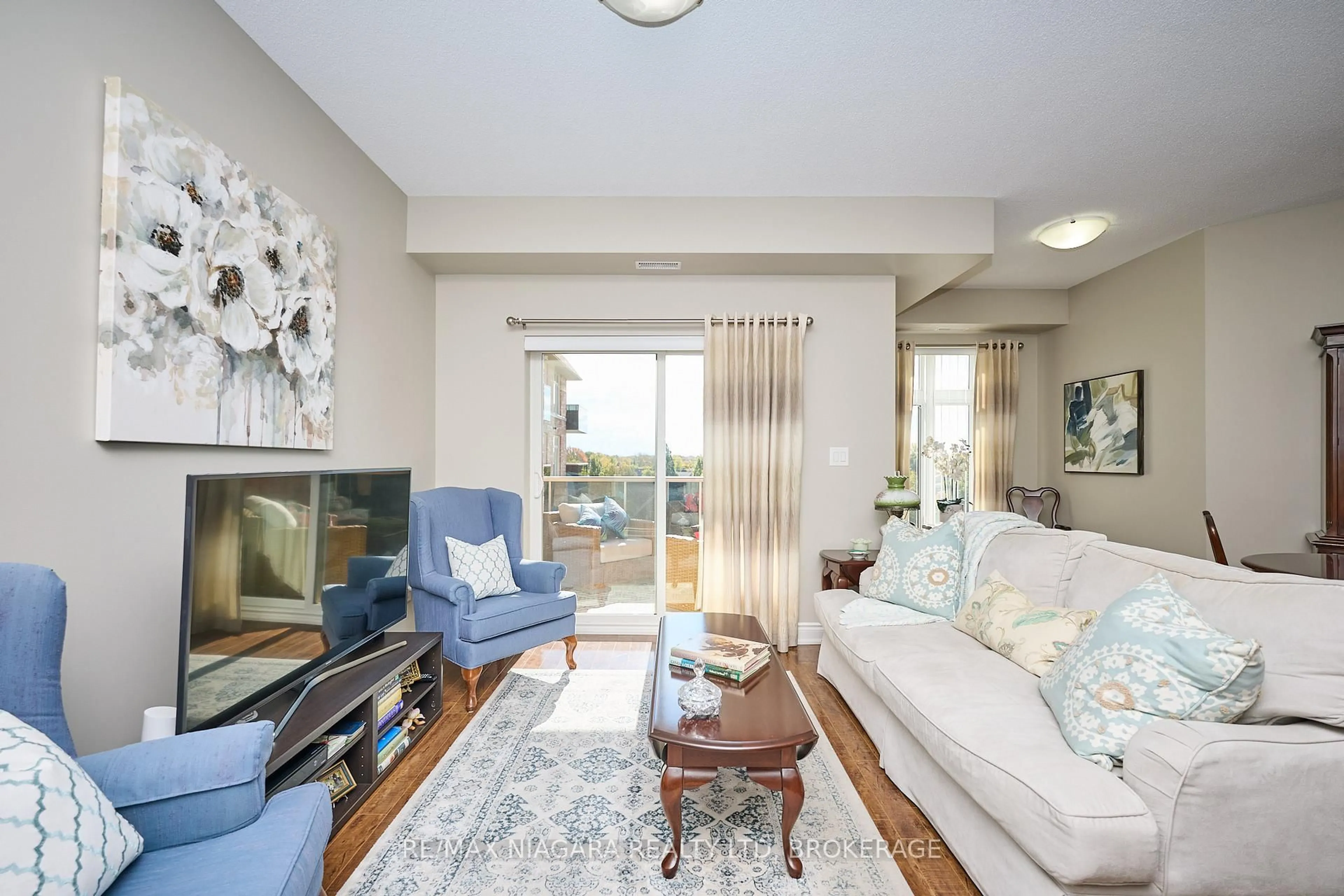 Living room with furniture, unknown for 8111 Forest Glen Dr #427, Niagara Falls Ontario L2H 2Y7