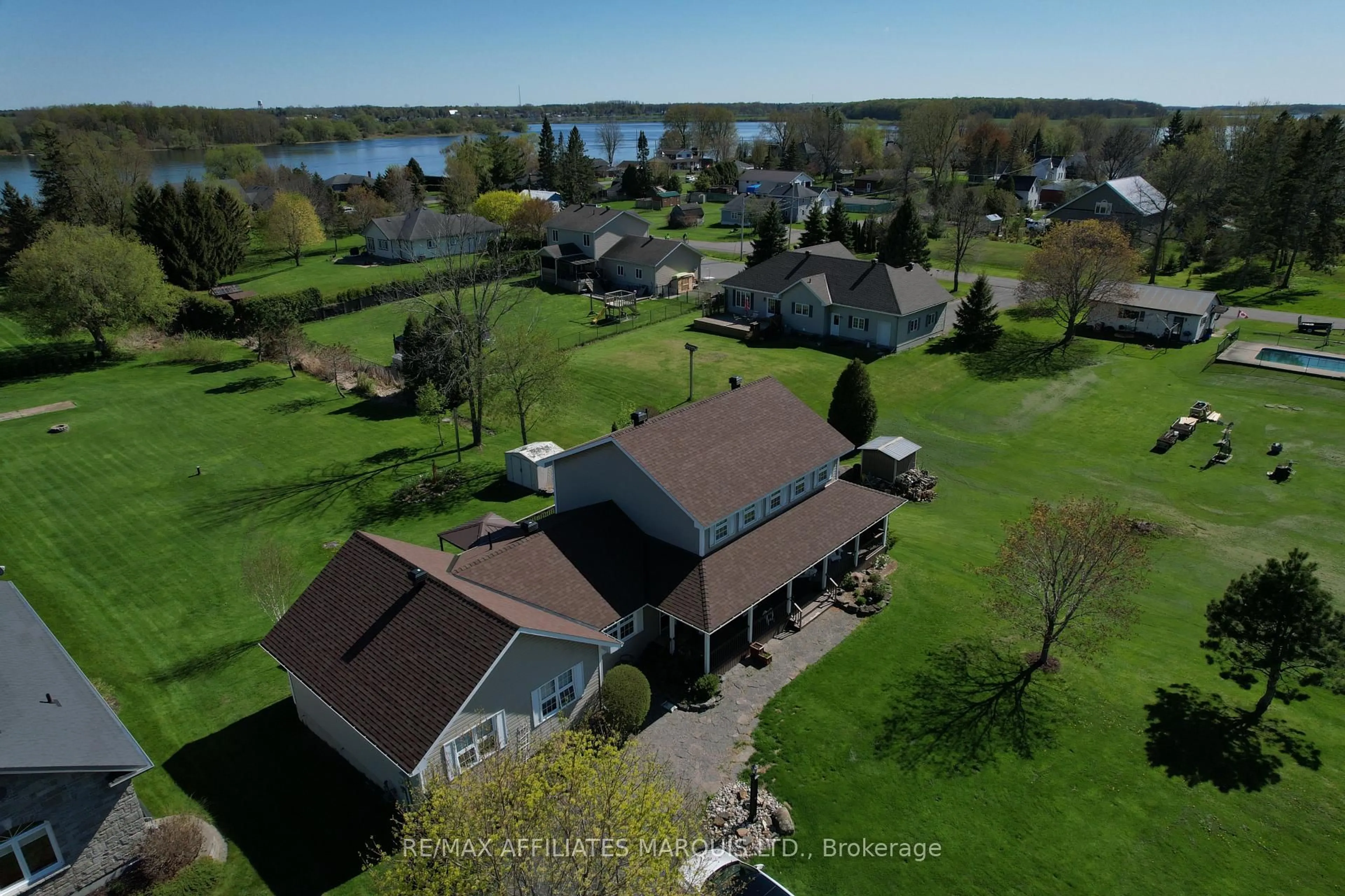 A pic from outside/outdoor area/front of a property/back of a property/a pic from drone, water/lake/river/ocean view for 12118 Lakeshore Dr, South Dundas Ontario K0C 1X0