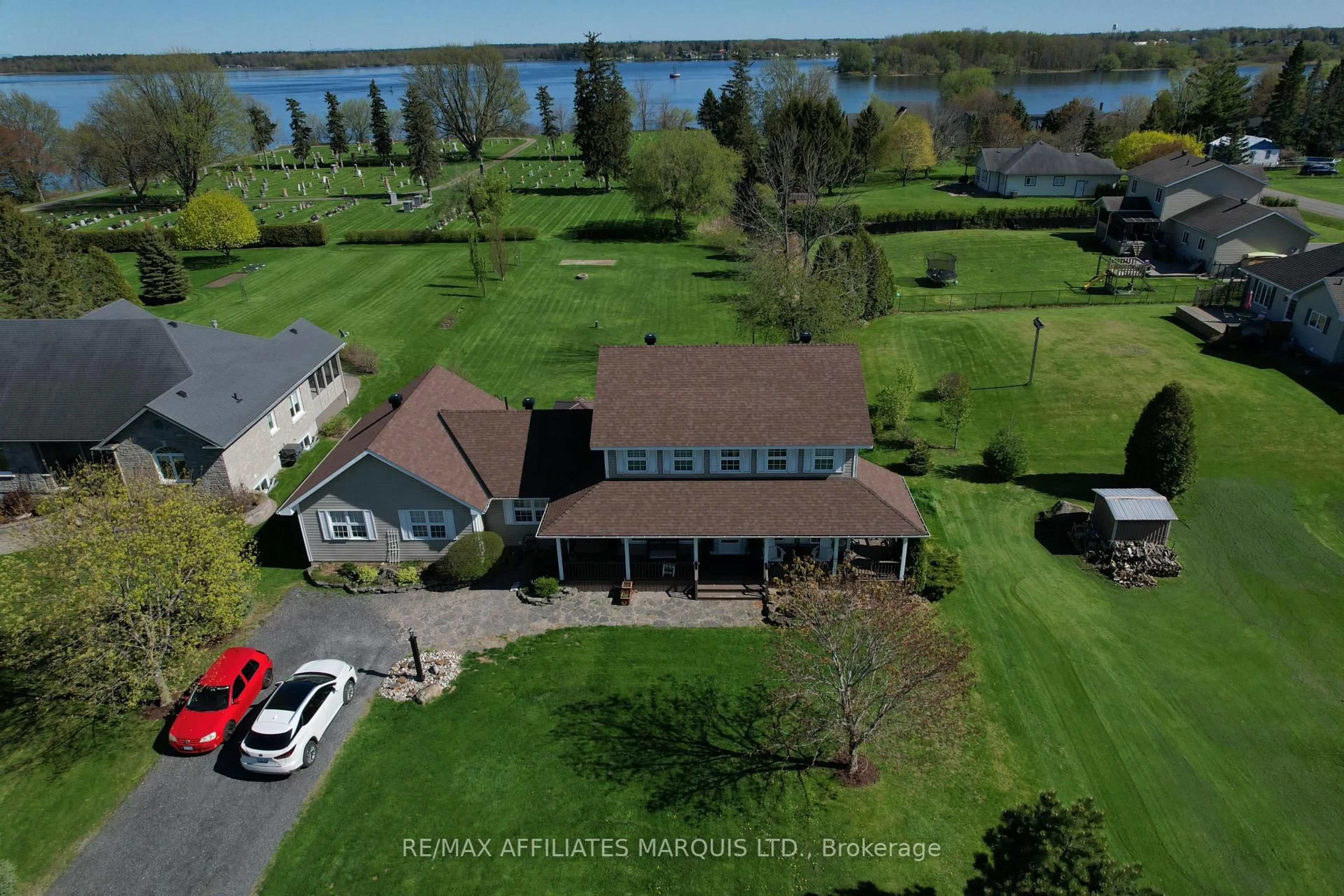 A pic from outside/outdoor area/front of a property/back of a property/a pic from drone, water/lake/river/ocean view for 12118 Lakeshore Dr, South Dundas Ontario K0C 1X0