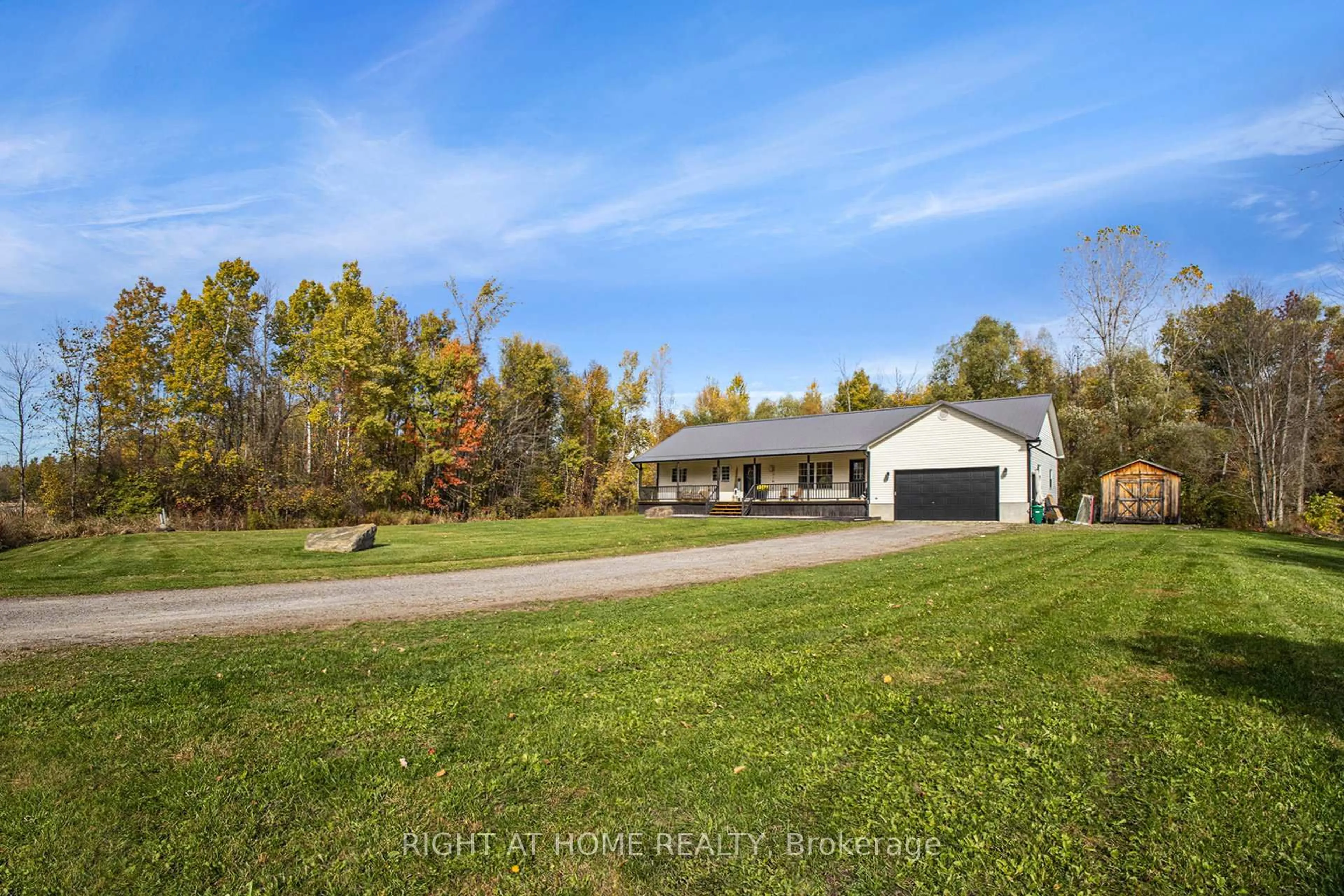 A pic from outside/outdoor area/front of a property/back of a property/a pic from drone, water/lake/river/ocean view for 2849 Blanchfield Rd, Osgoode Ontario K0A 2W0
