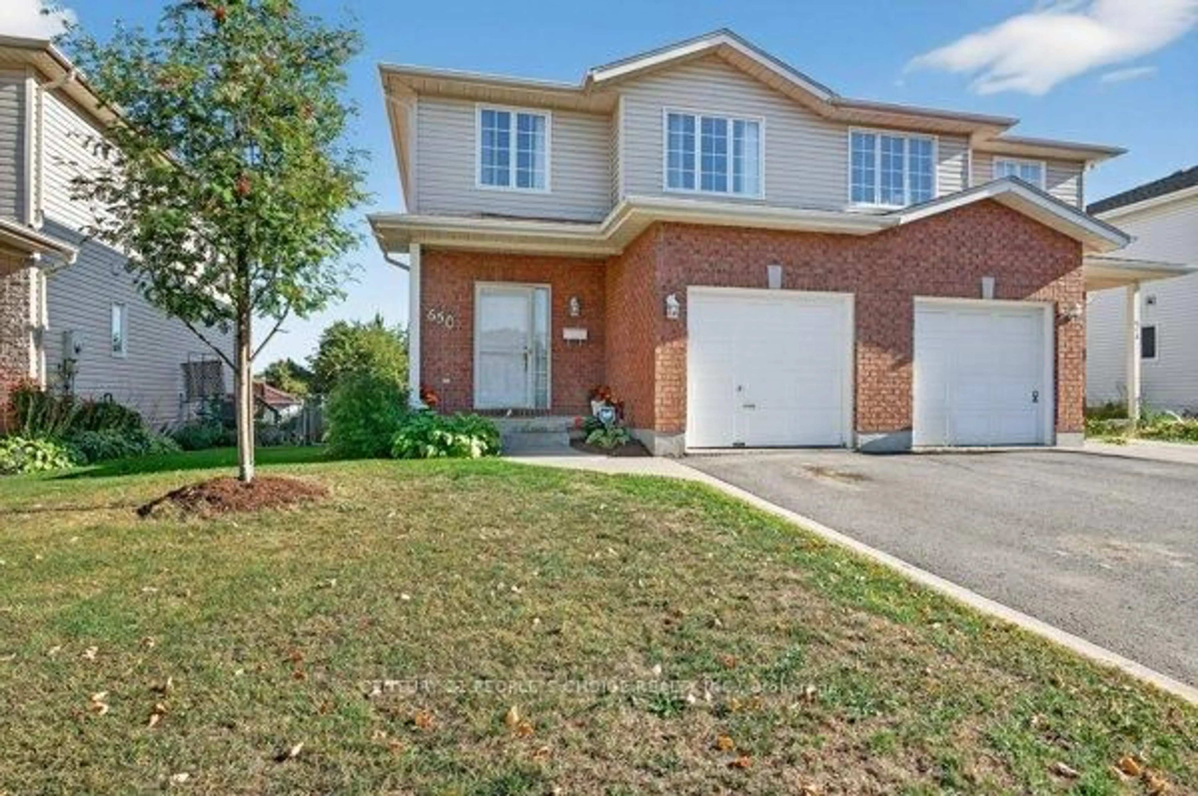 Home with brick exterior material, street for 650 Tanner Dr, Kingston Ontario K7M 8Y2