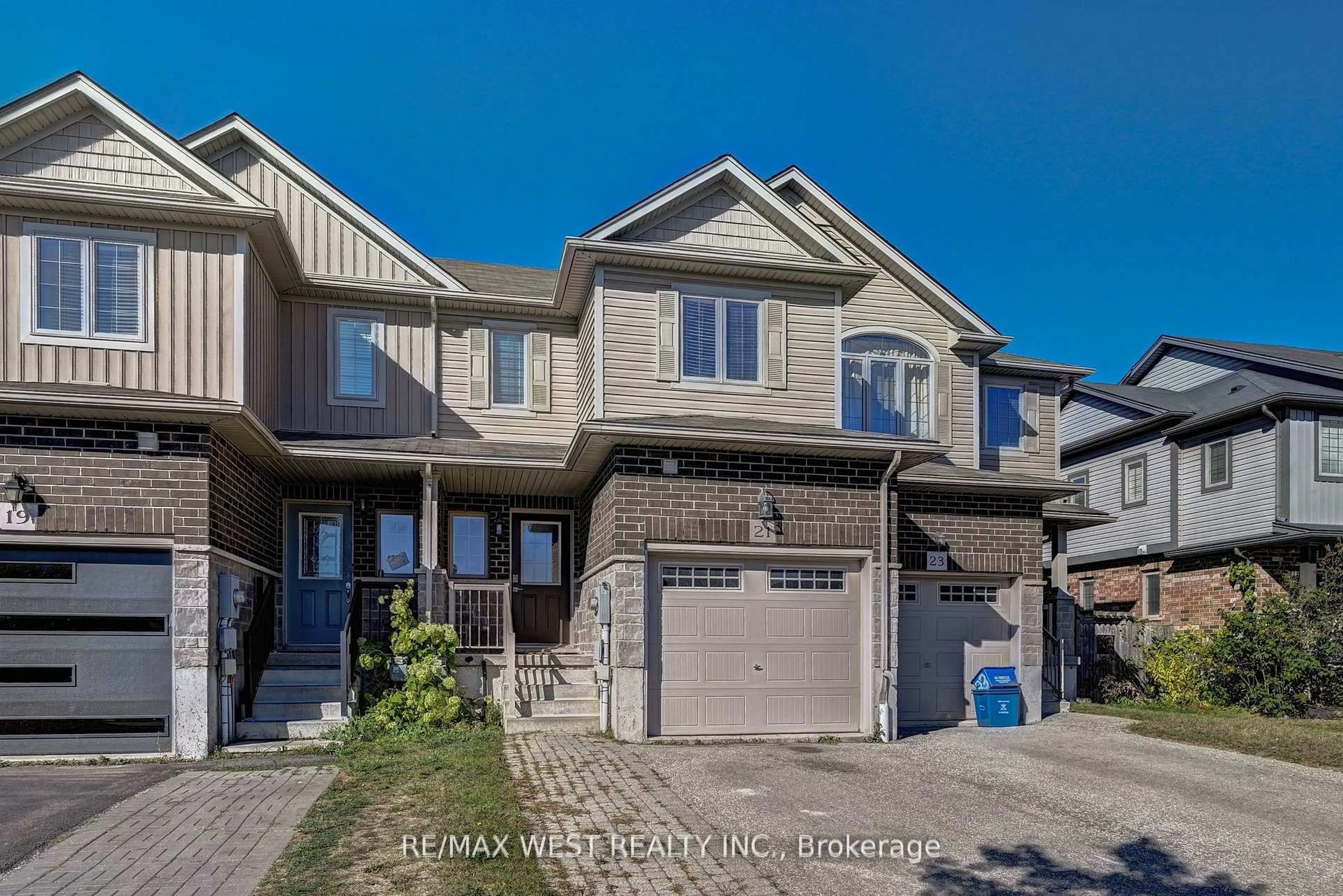 Home with brick exterior material, street for 21 Machado St, Kitchener Ontario N2R 0C1