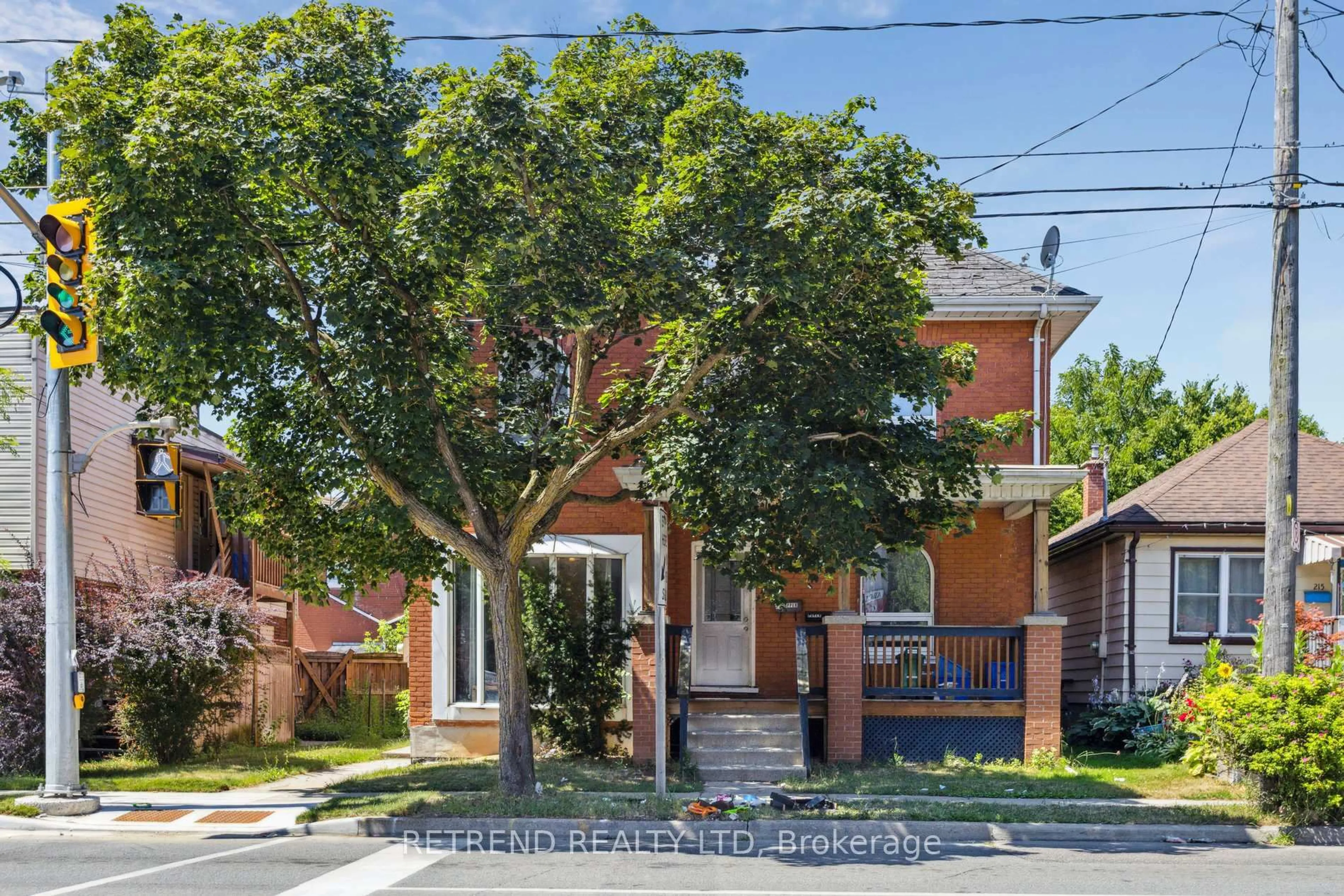 Home with brick exterior material, street for 219 Erie Ave, Brantford Ontario N3S 2H1