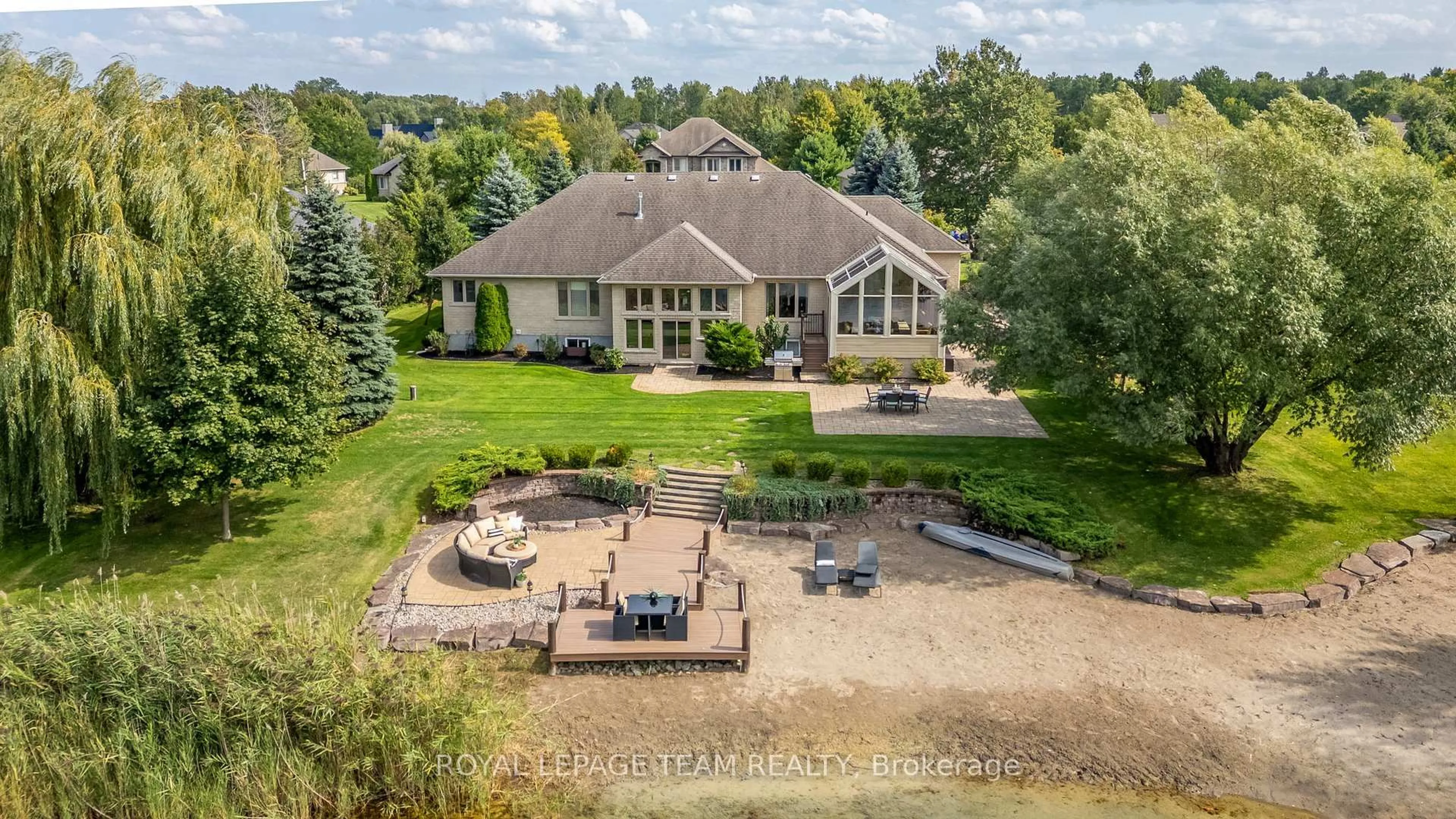 A pic from outside/outdoor area/front of a property/back of a property/a pic from drone, water/lake/river/ocean view for 6903 Lake Forest Walk, Greely Ontario K4P 1R7