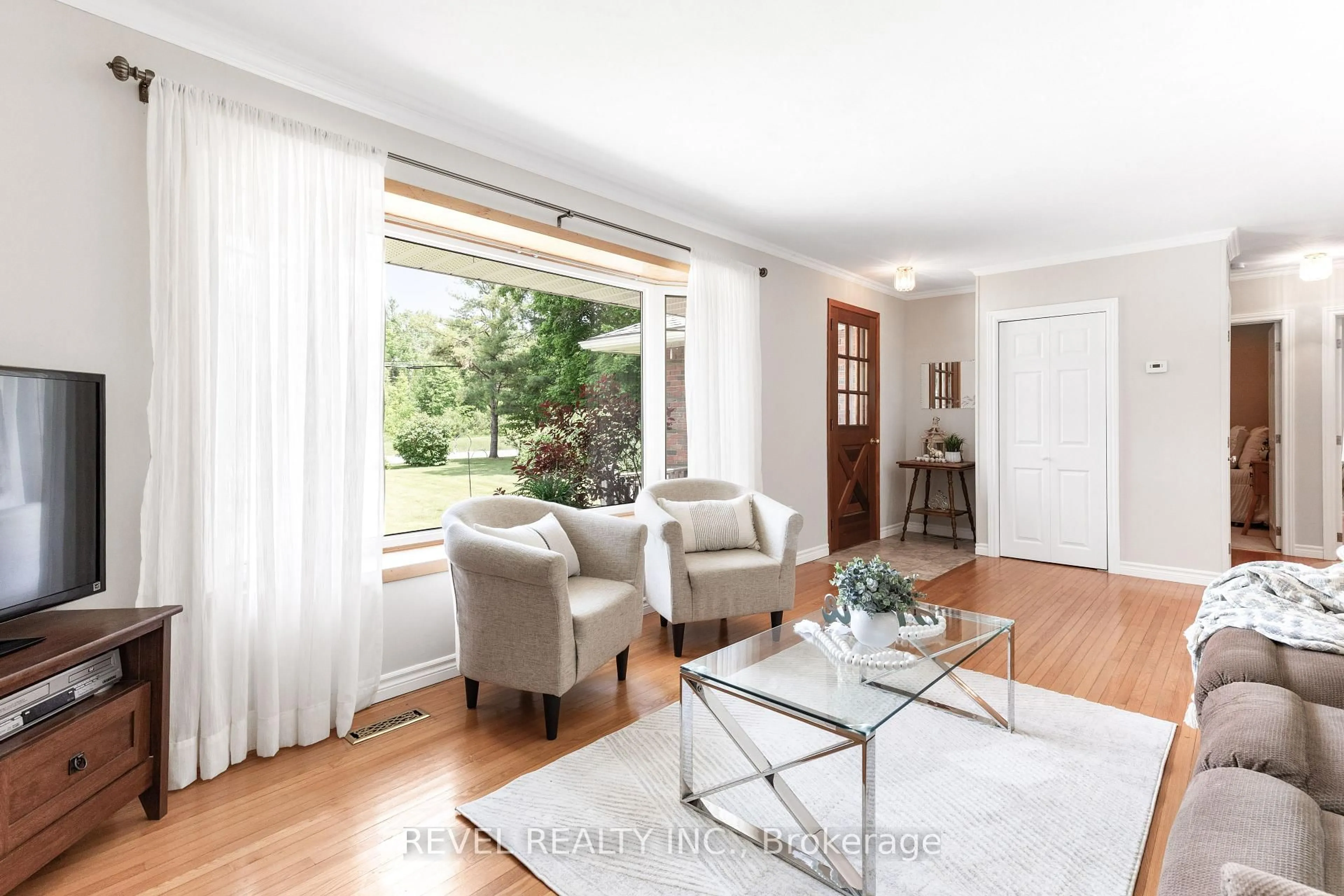Living room with furniture, wood/laminate floor for 2796 COUNTY RD 48 Rd, Kawartha Lakes Ontario K0M 1K0
