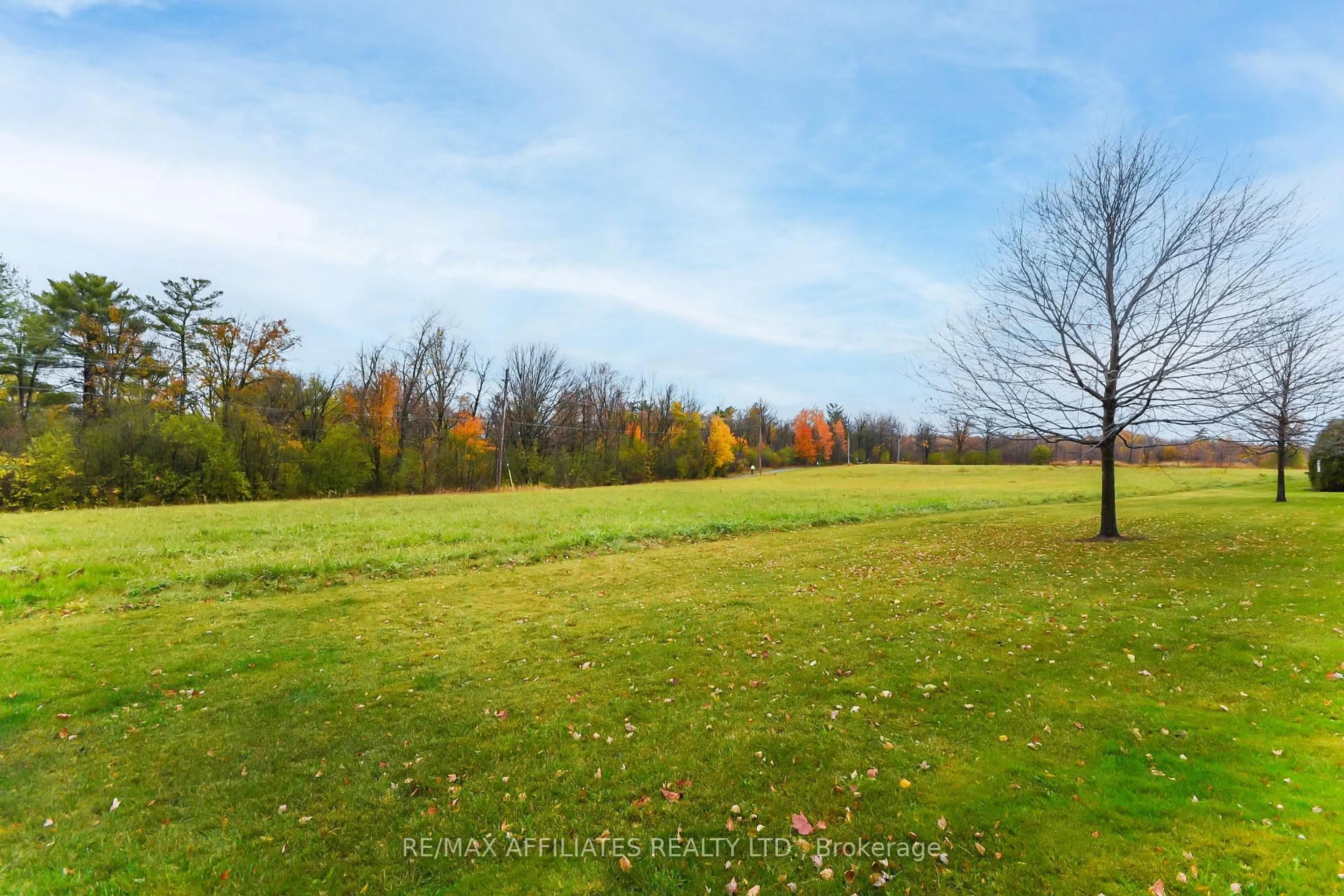 A pic from outside/outdoor area/front of a property/back of a property/a pic from drone, forest/trees view for 758 St Andre Dr #87A, Ottawa Ontario K1C 4S6