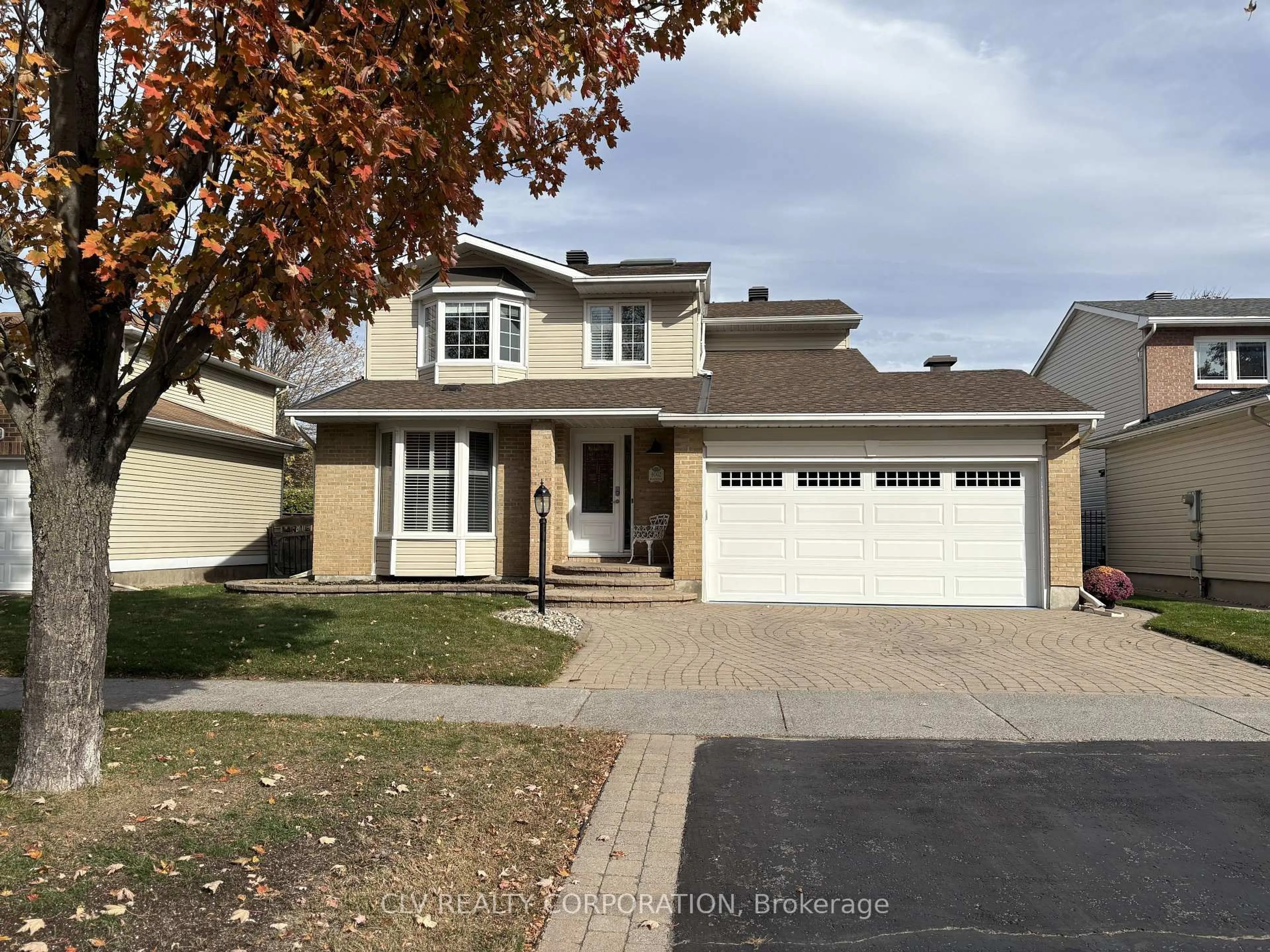 Home with vinyl exterior material, street for 6002 Meadowglen Dr, Ottawa Ontario K1C 5T3