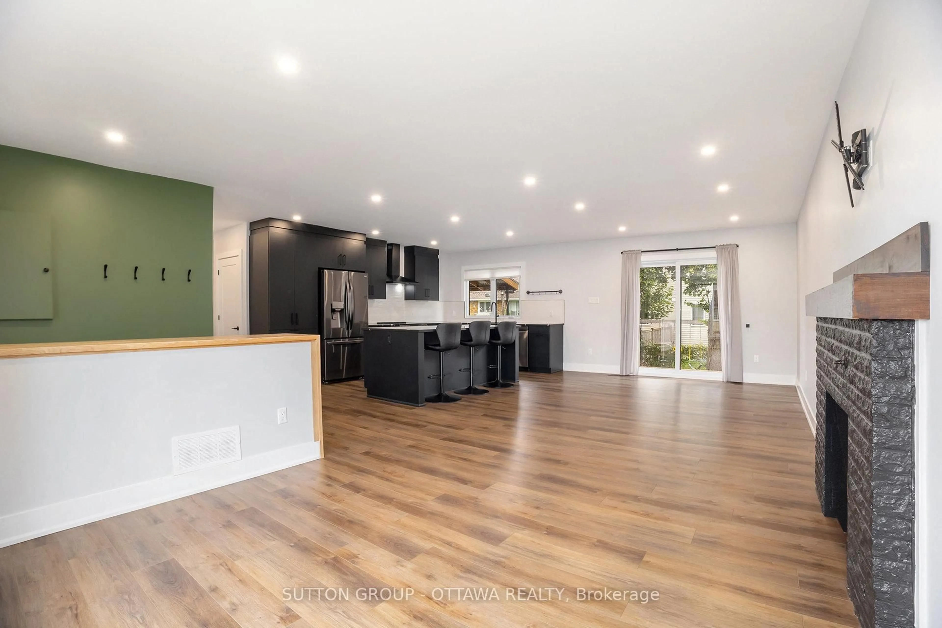 Open concept kitchen, wood/laminate floor for 1299 Brookline Ave, Ottawa Ontario K1V 6S4