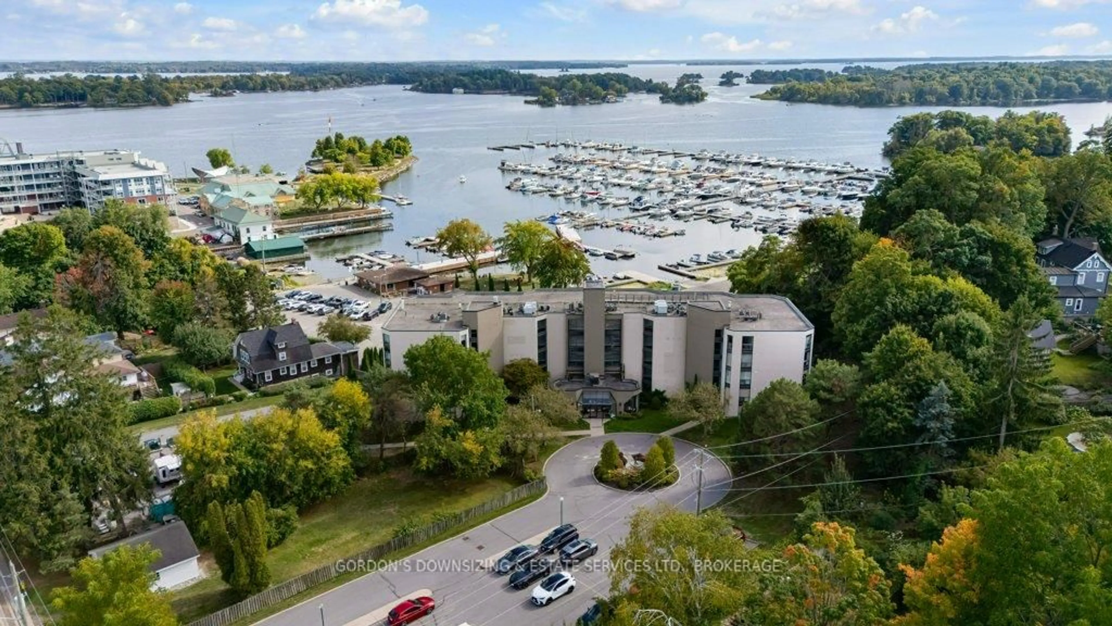 A pic from outside/outdoor area/front of a property/back of a property/a pic from drone, water/lake/river/ocean view for 50 Market St St #105, Gananoque Ontario K7G 2M3