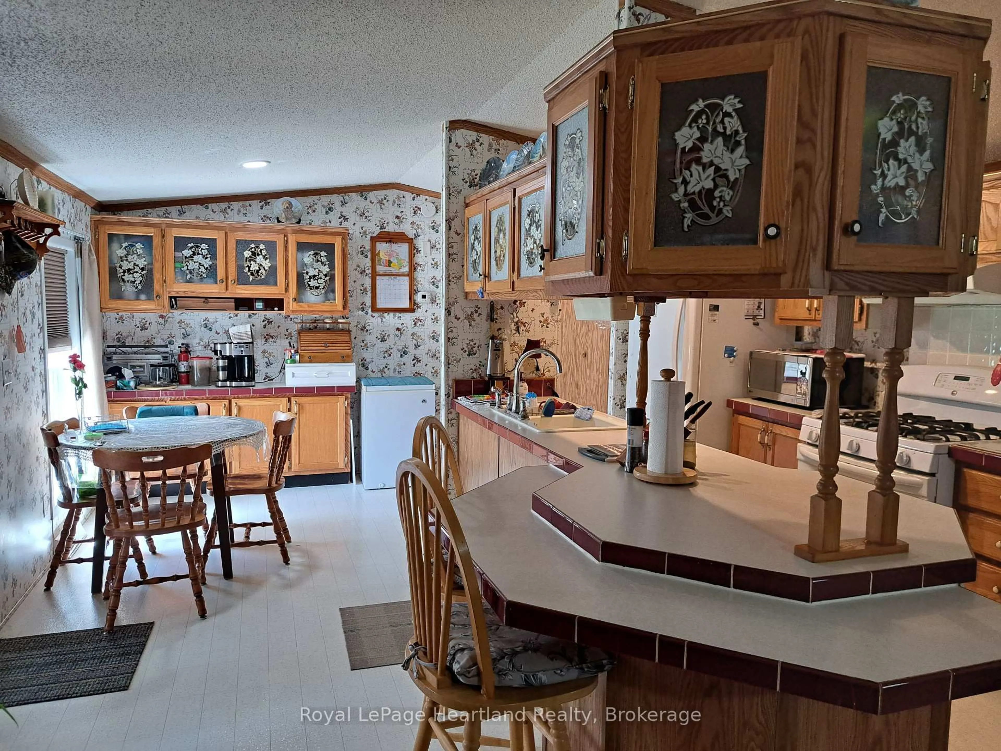 Open concept kitchen, ceramic/tile floor for 39461 Dashwood Rd #8, South Huron Ontario N0M 1W0