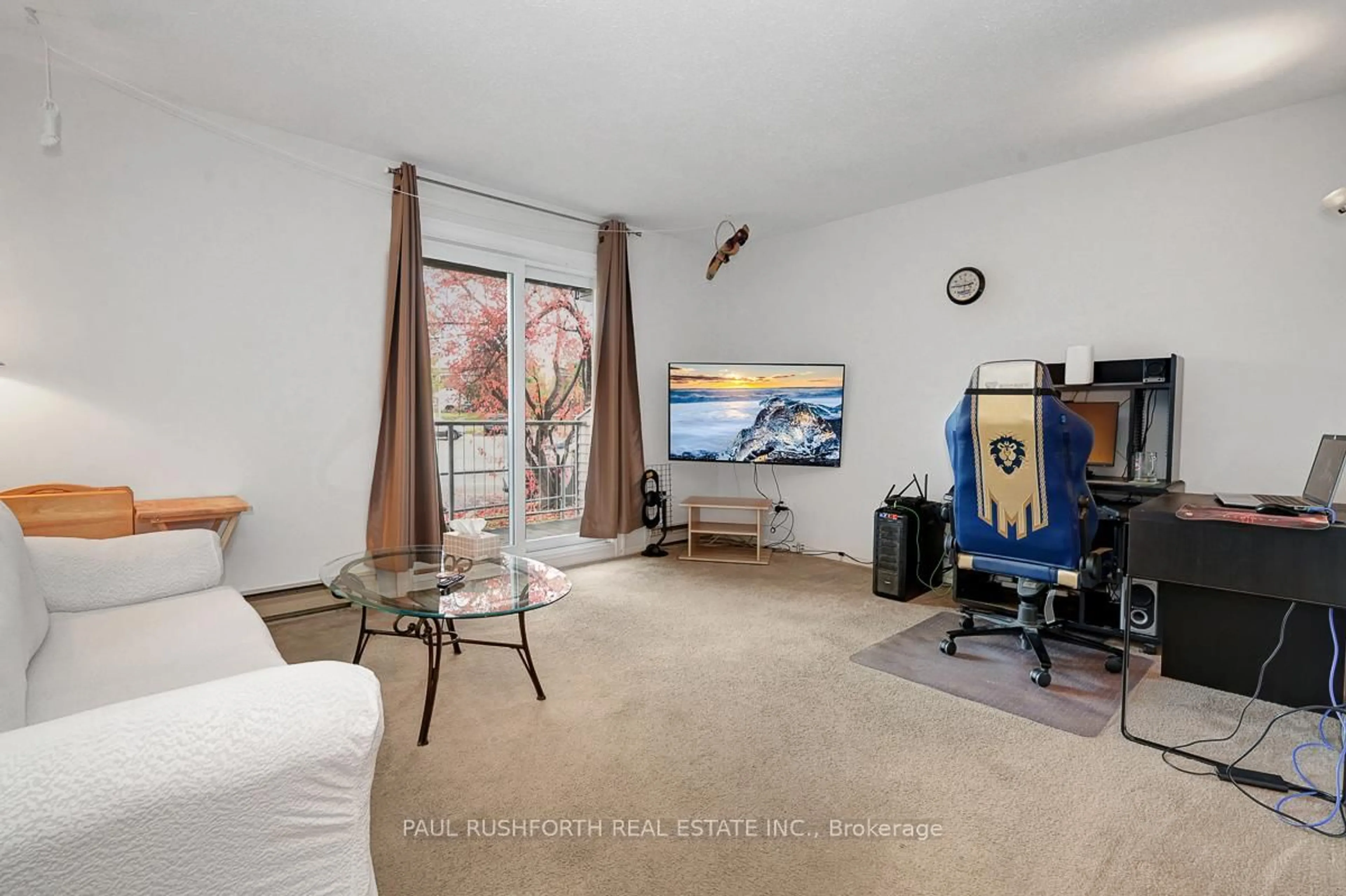 Living room with furniture, unknown for 260 Brittany Dr #214, Ottawa Ontario K1K 4M2