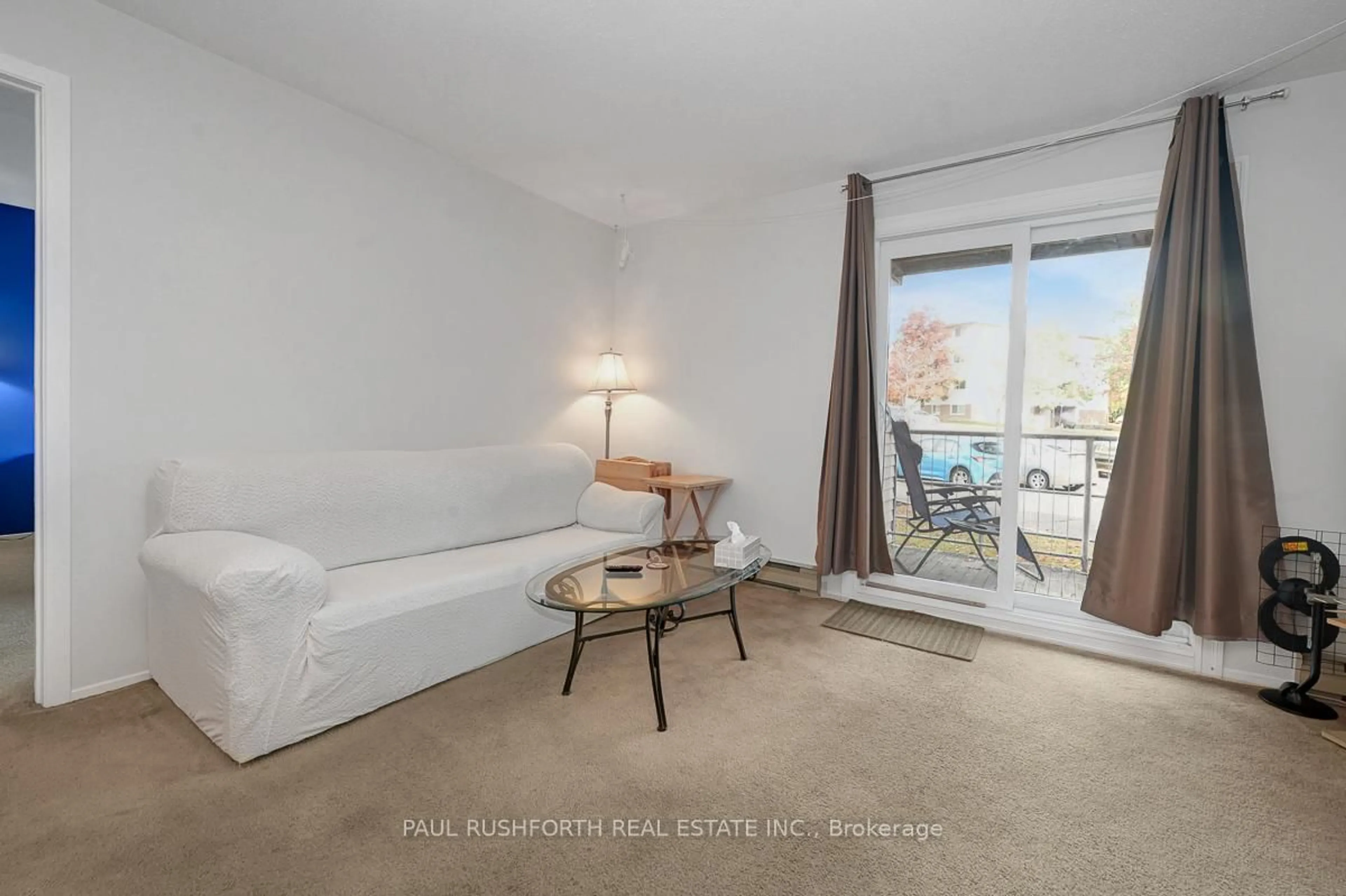 Living room with furniture, unknown for 260 Brittany Dr #214, Ottawa Ontario K1K 4M2