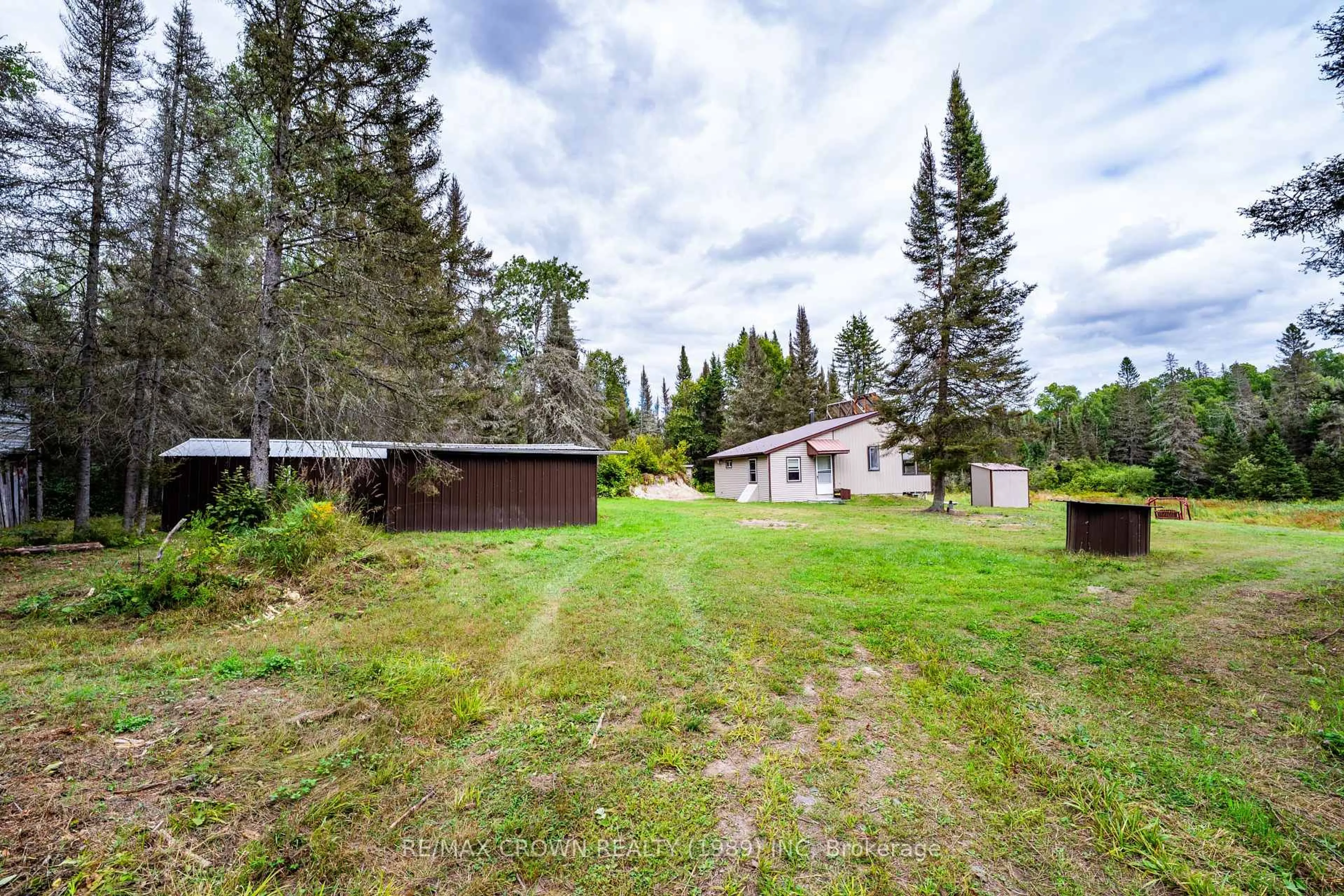 A pic from outside/outdoor area/front of a property/back of a property/a pic from drone, unknown for 346 Cameron Rd, Papineau-Cameron Ontario P0H 1V0