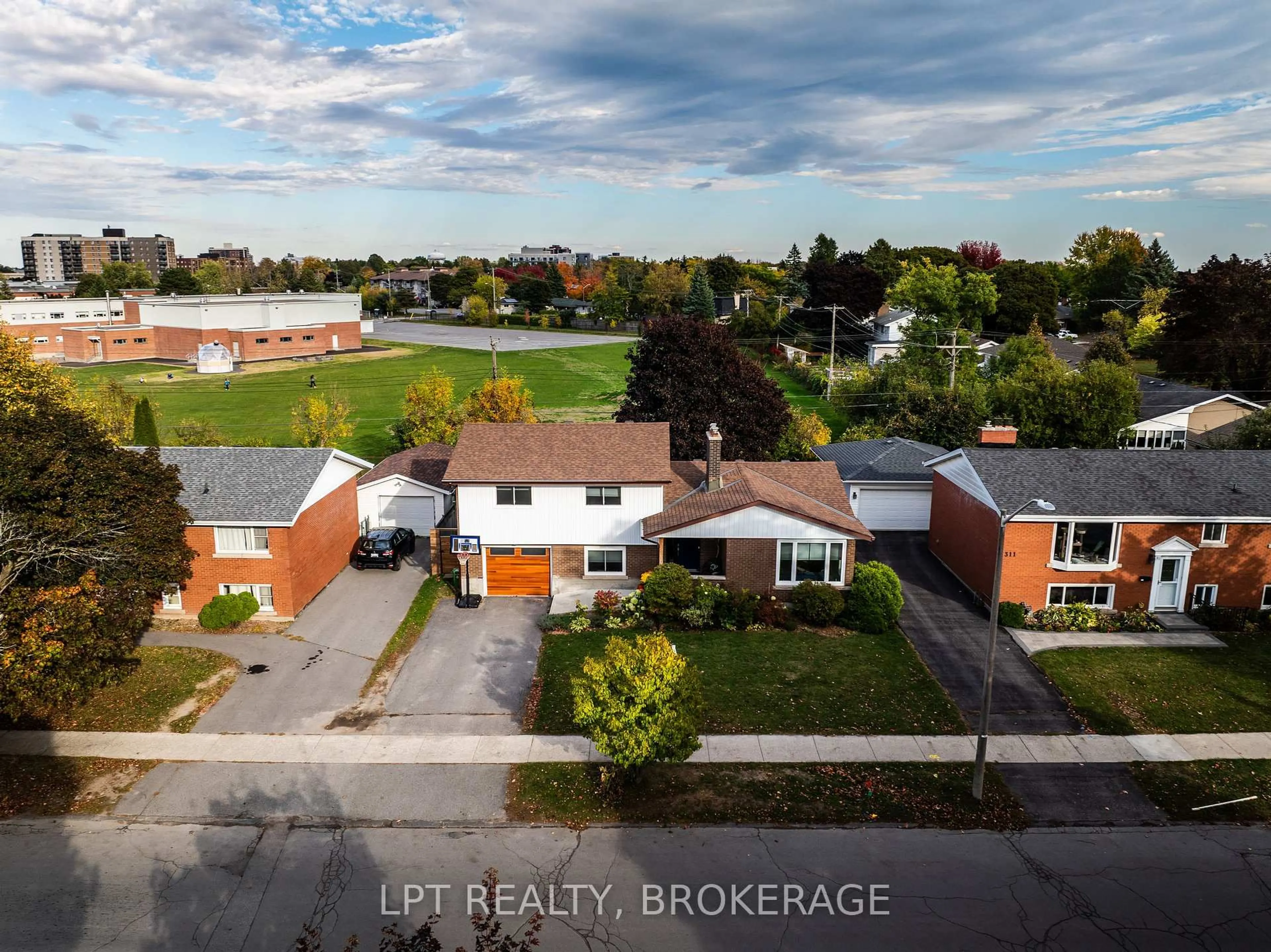 A pic from outside/outdoor area/front of a property/back of a property/a pic from drone, street for 315 Norman Rogers Dr, Kingston Ontario K7M 2R7