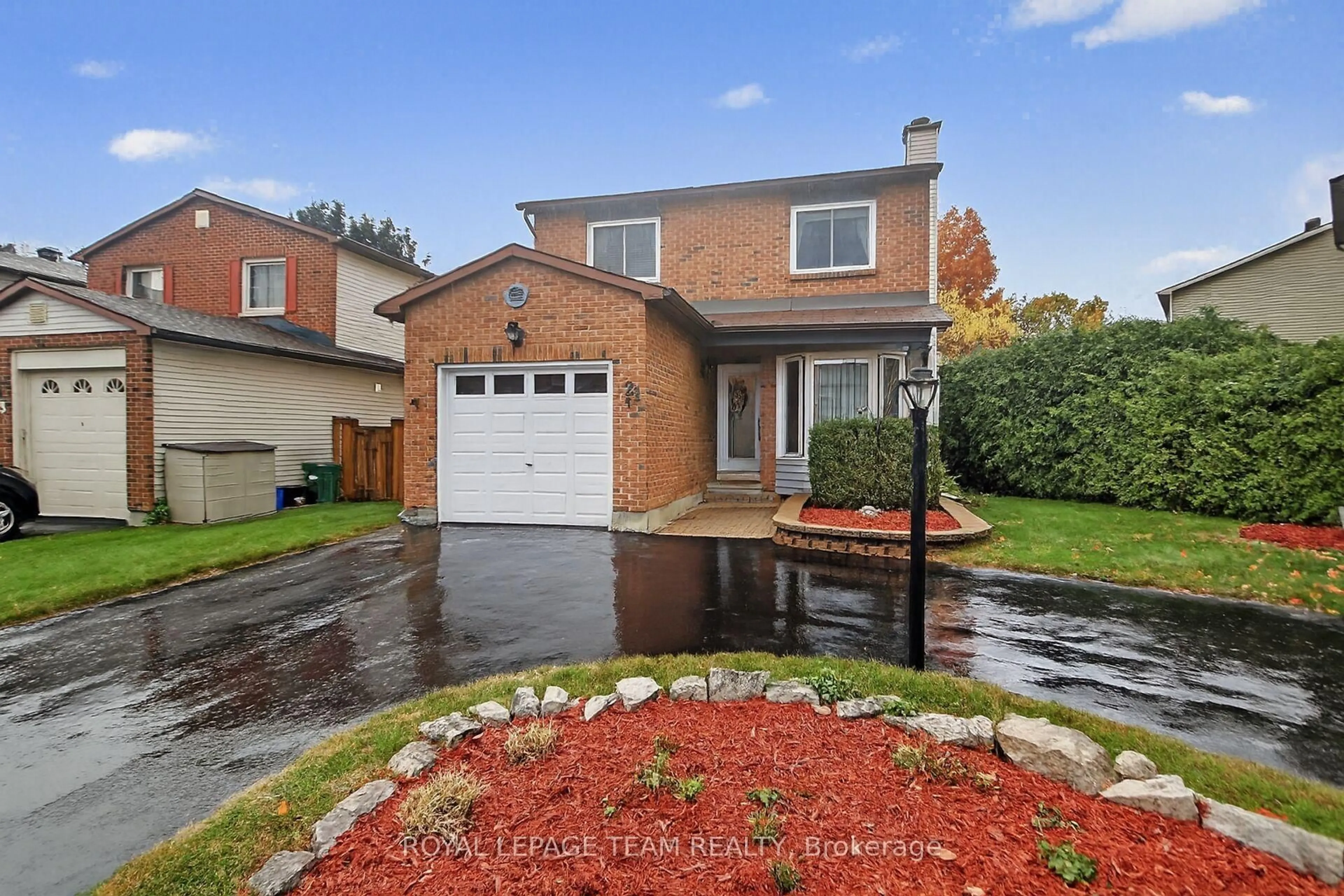 Home with brick exterior material, street for 21 Raftus Sq, Ottawa Ontario K2J 2K9