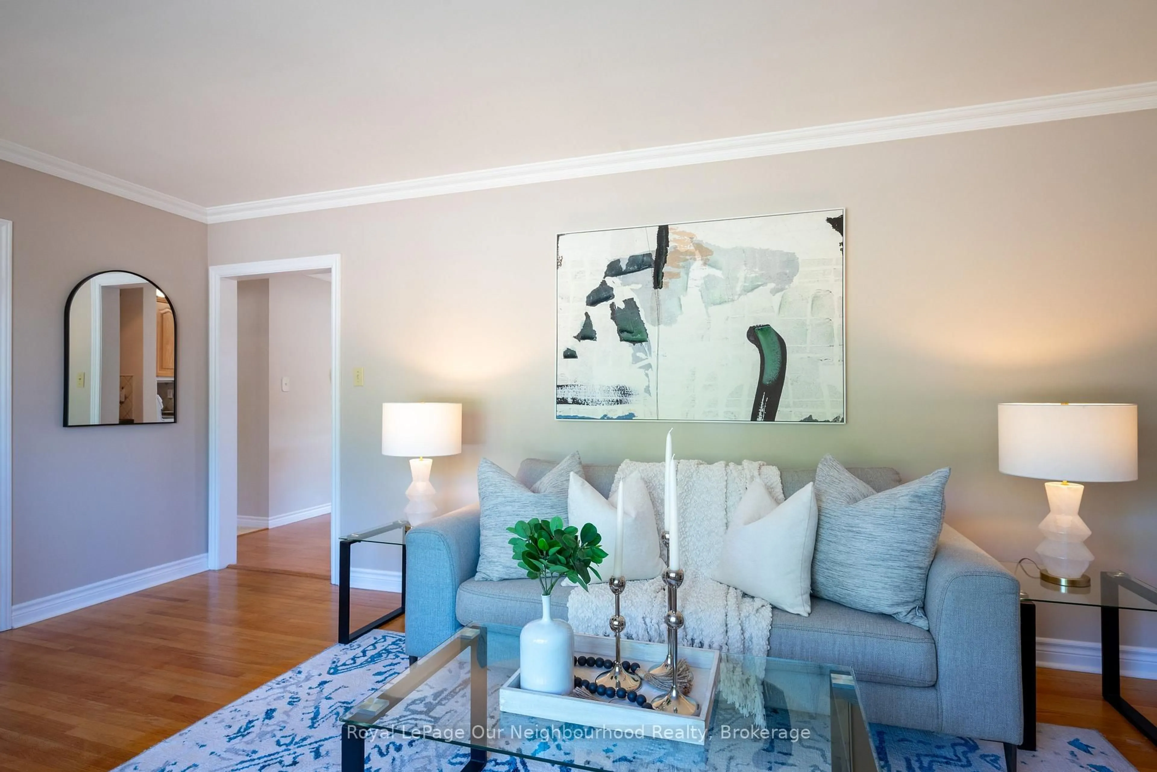 Living room with furniture, wood/laminate floor for 81 D'arcy St, Cobourg Ontario K9A 3Z7