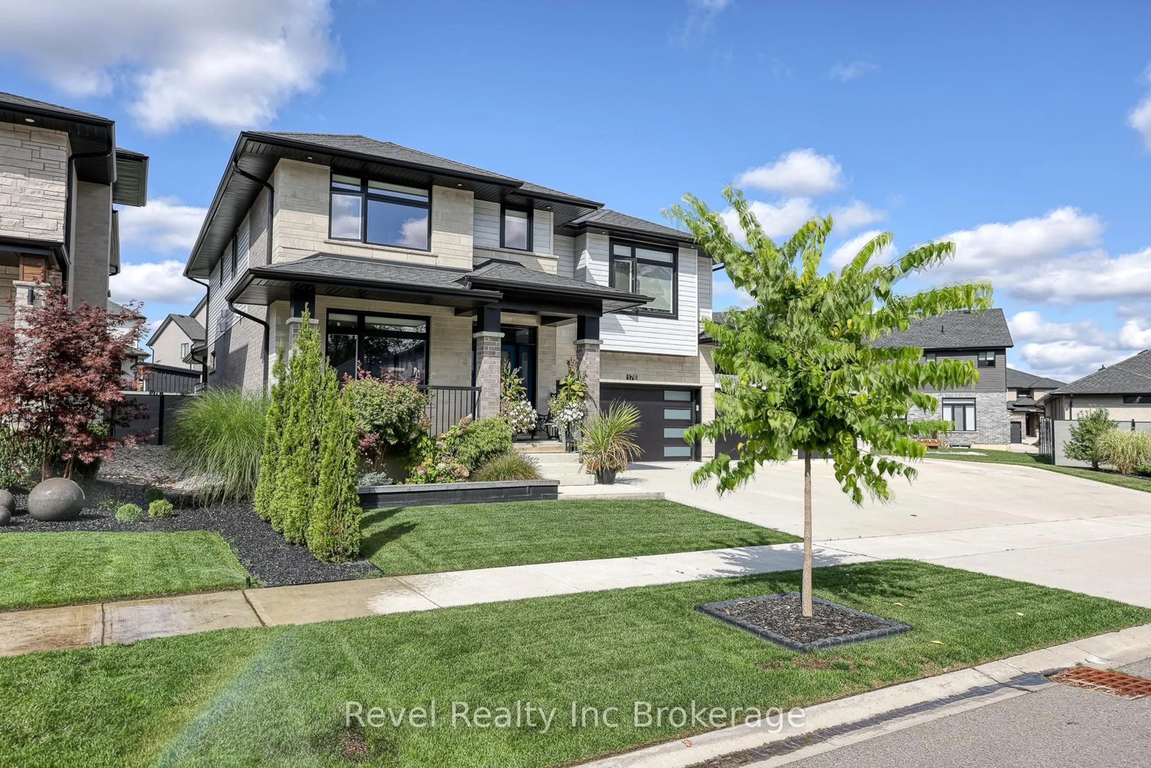 Home with brick exterior material, street for 176 Tamarack Blvd, Woodstock Ontario N4S 0E2