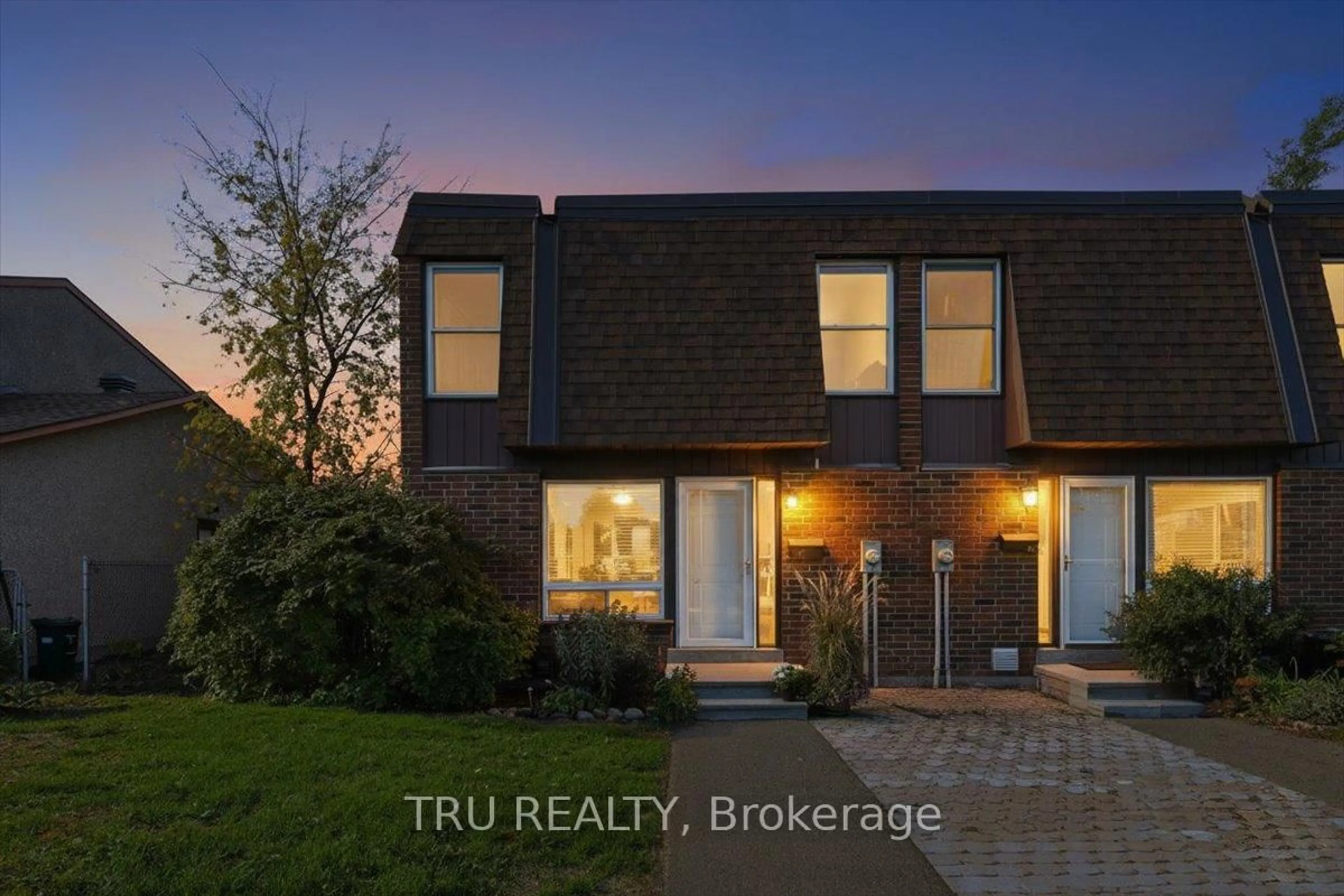 Home with brick exterior material, street for 2290 Cotters Cres #65, Ottawa Ontario K1V 8Y6