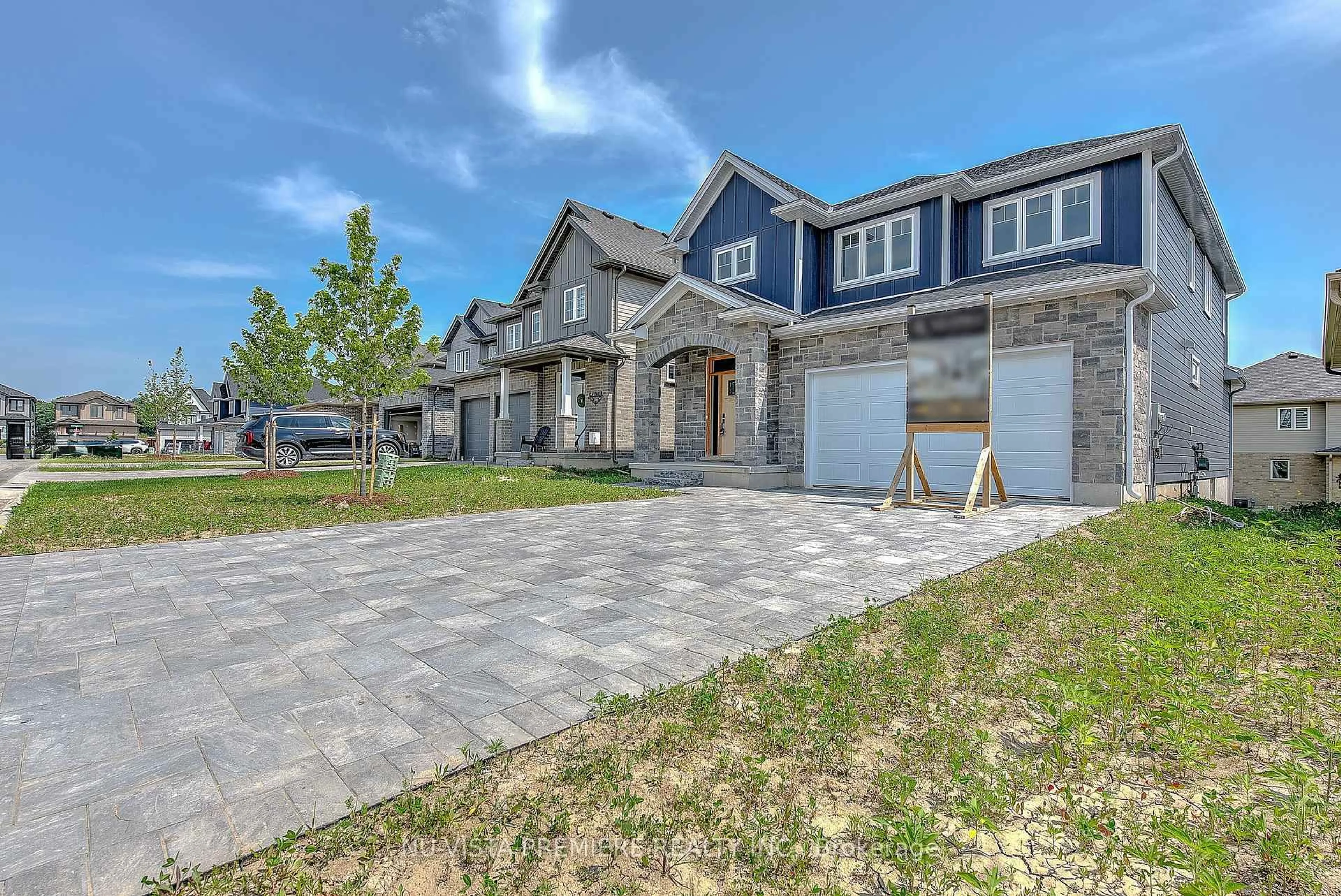 Home with brick exterior material, street for 28 Basil Cres, Middlesex Centre Ontario N0M 2A0