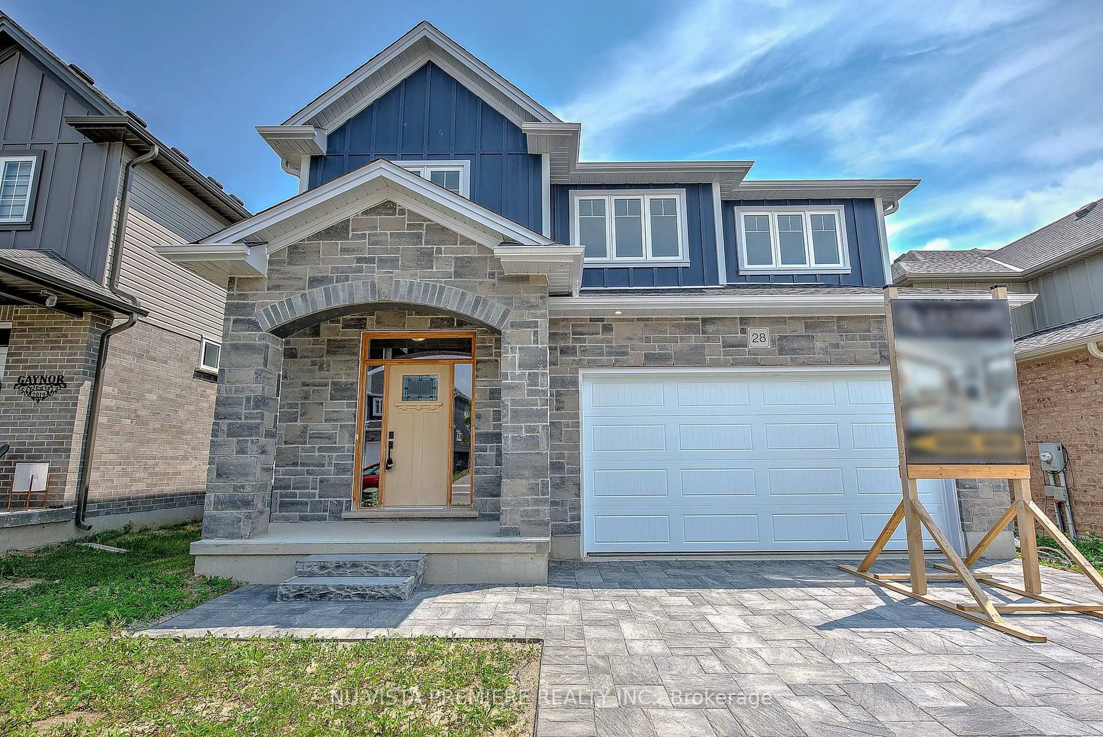 Home with brick exterior material, street for 28 Basil Cres, Middlesex Centre Ontario N0M 2A0