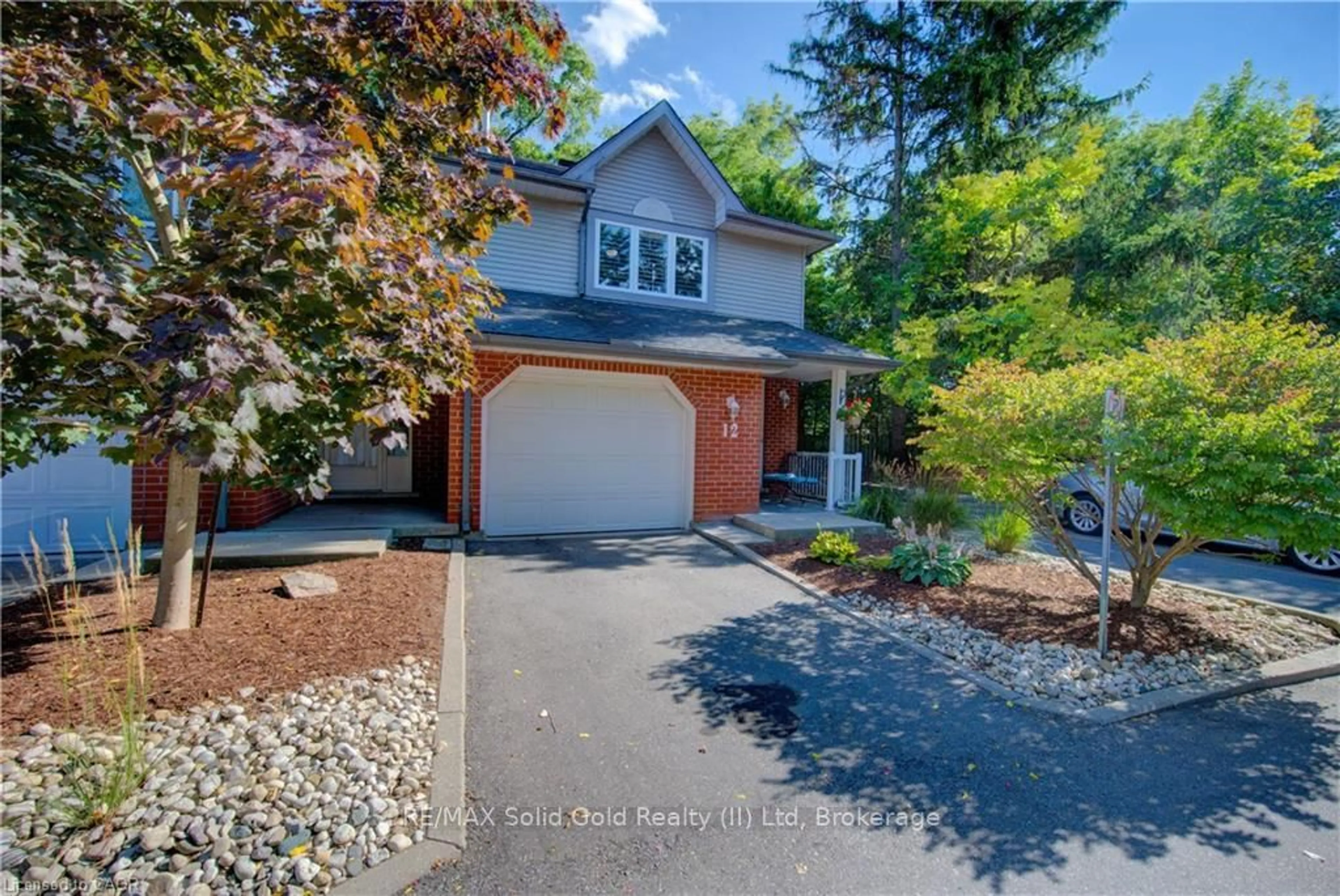 Home with brick exterior material, street for 89 Woolwich St #12, Waterloo Ontario N2K 1S5