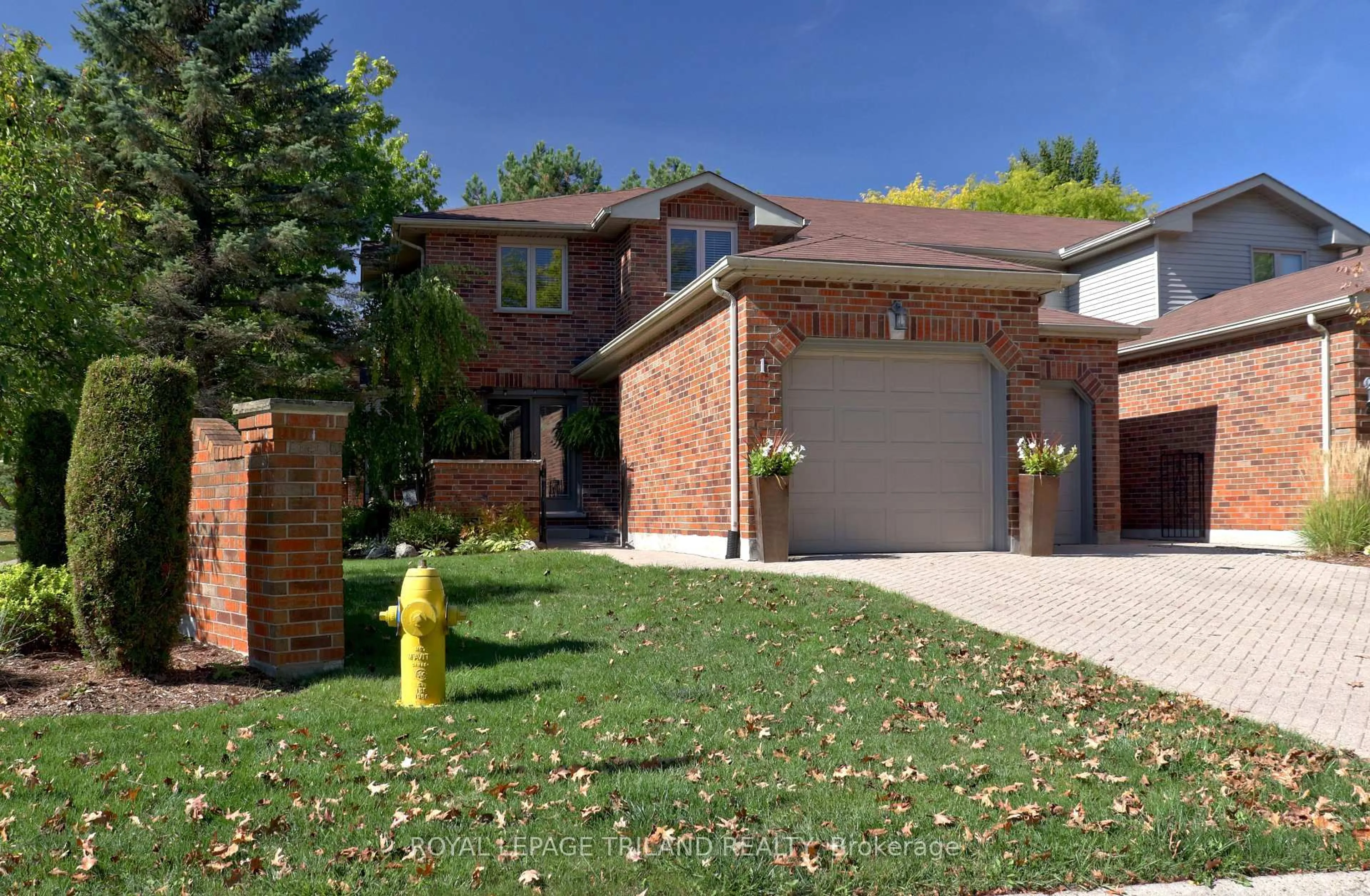 Home with brick exterior material, street for 70 Sunnyside Dr #1, London North Ontario N5X 3W4