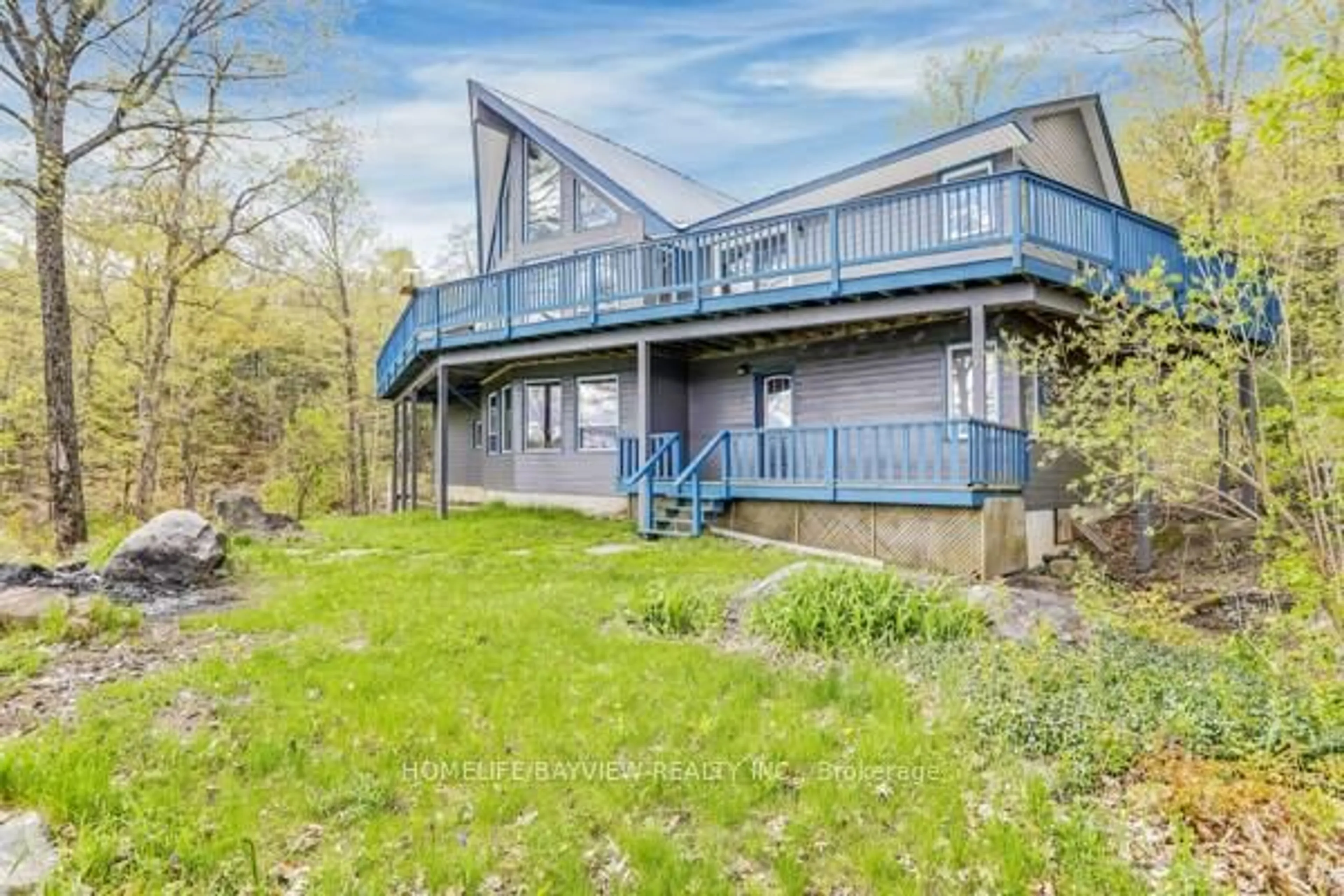 A pic from outside/outdoor area/front of a property/back of a property/a pic from drone, water/lake/river/ocean view for 19243 Hwy 35 Highway, Algonquin Highlands Ontario K0M 1J2