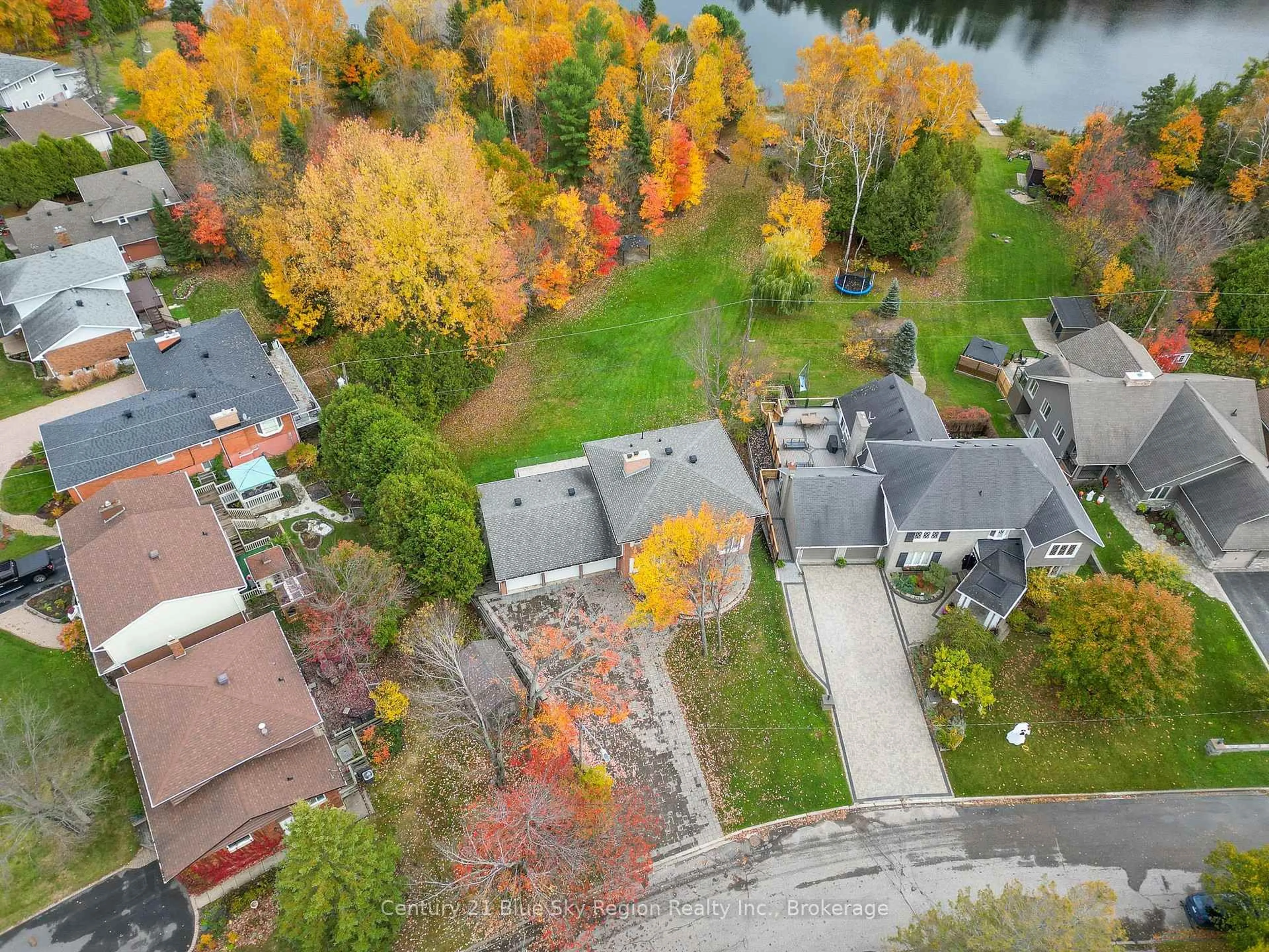 A pic from outside/outdoor area/front of a property/back of a property/a pic from drone, water/lake/river/ocean view for 614 Guinevere Crt, North Bay Ontario P1A 3N9