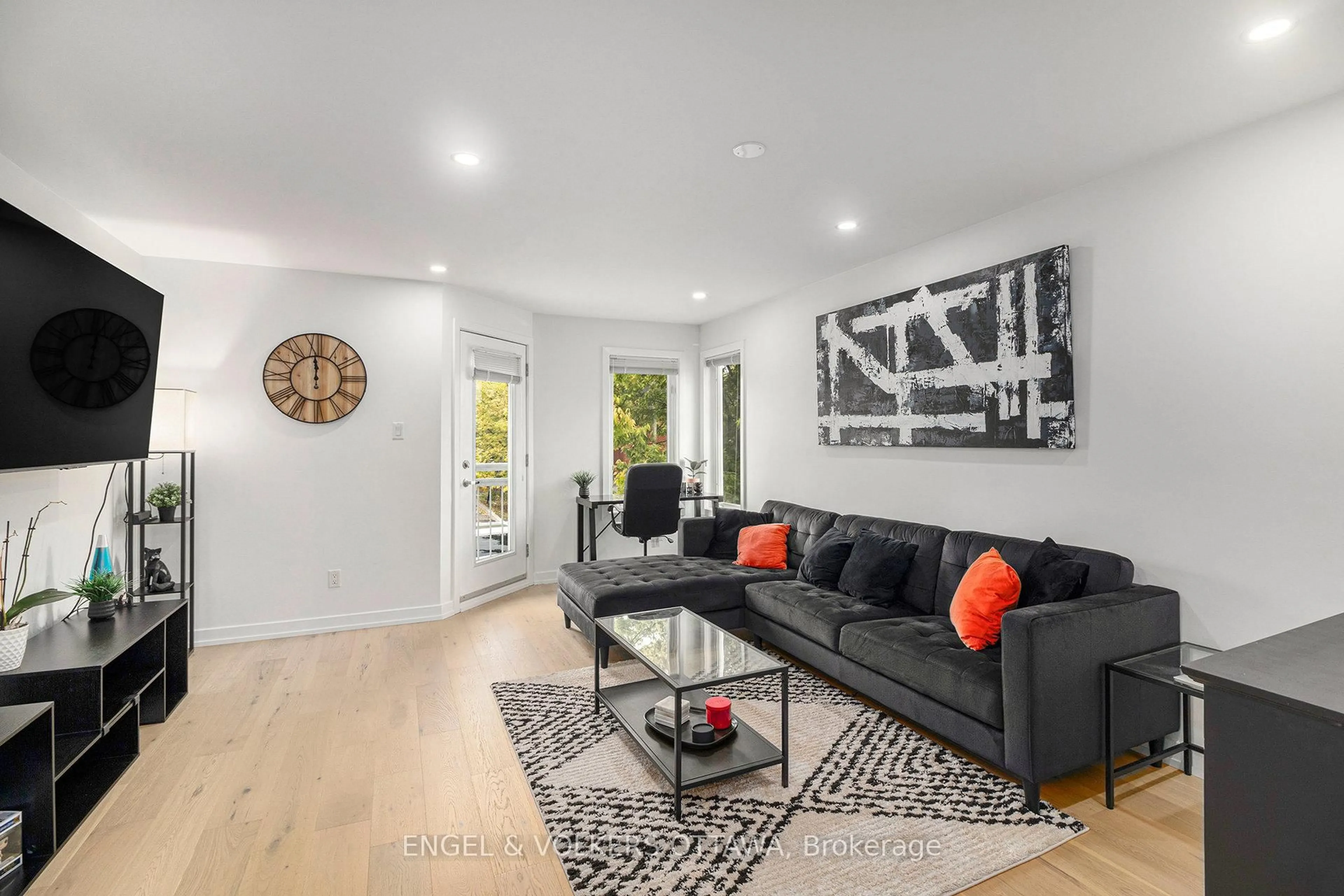 Living room with furniture, unknown for 4522 Innes Rd #D, Ottawa Ontario K4A 0X5